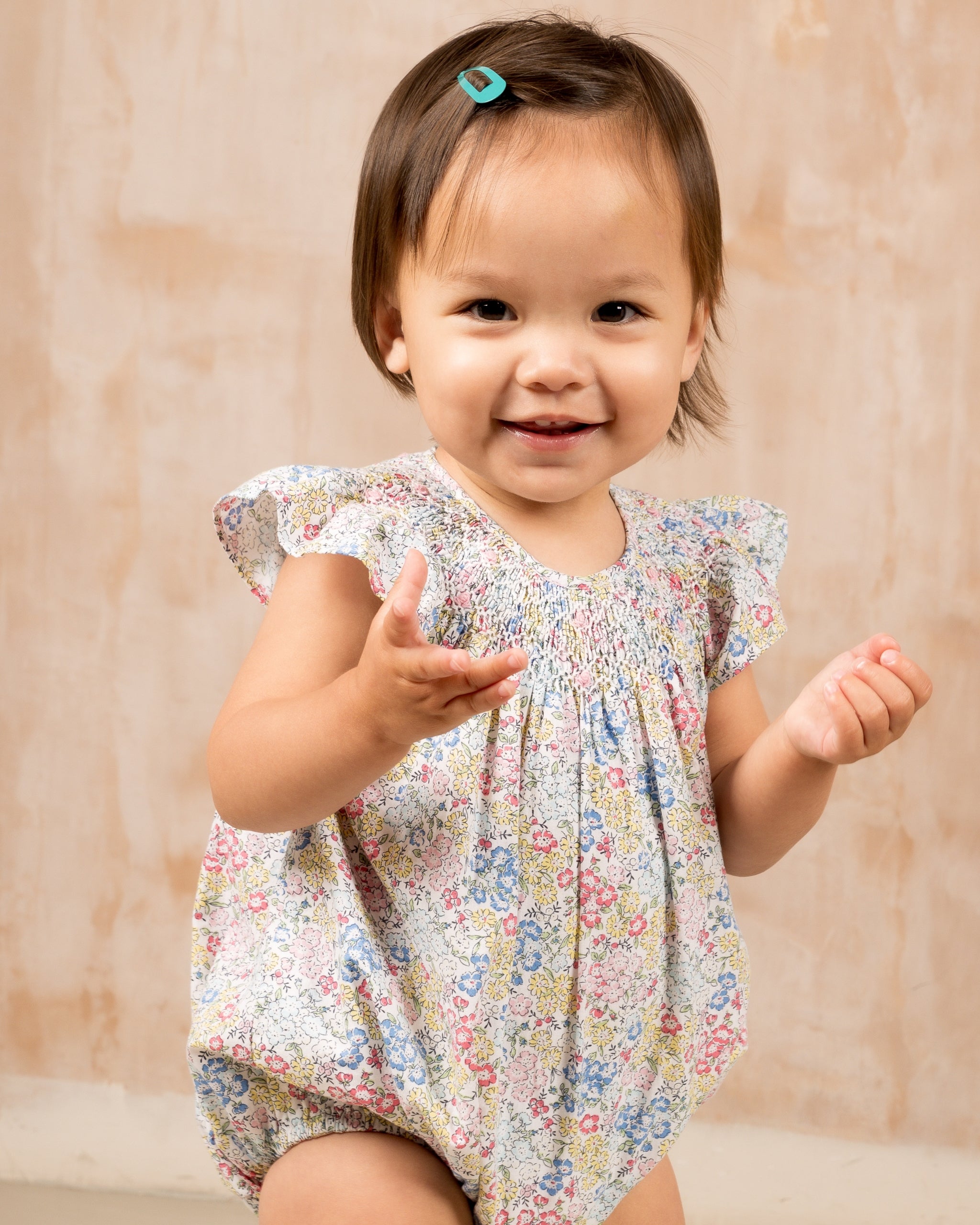 baby in smocked bubble
