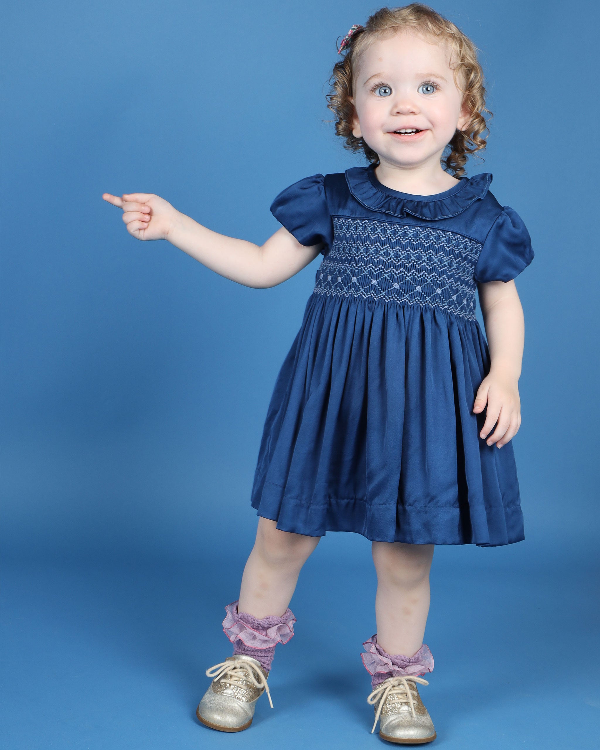 toddler in navy satin party derss