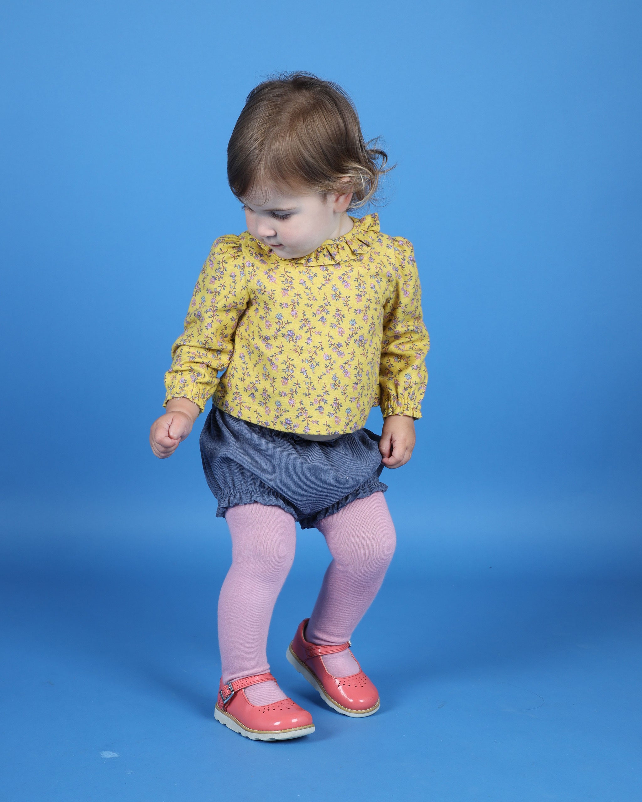 baby in blouse and shorts for fall