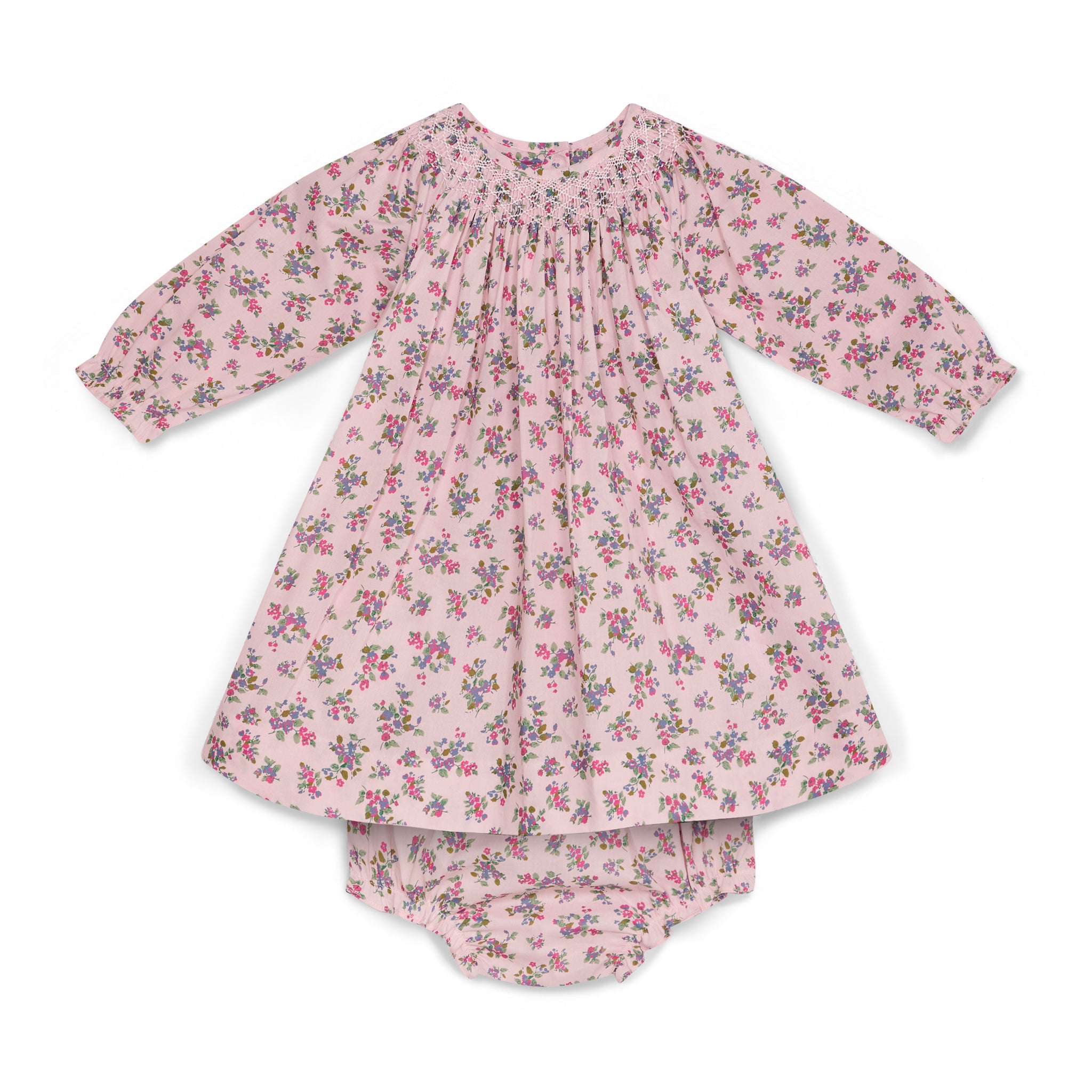 Floral dress and bloomers set on a white background