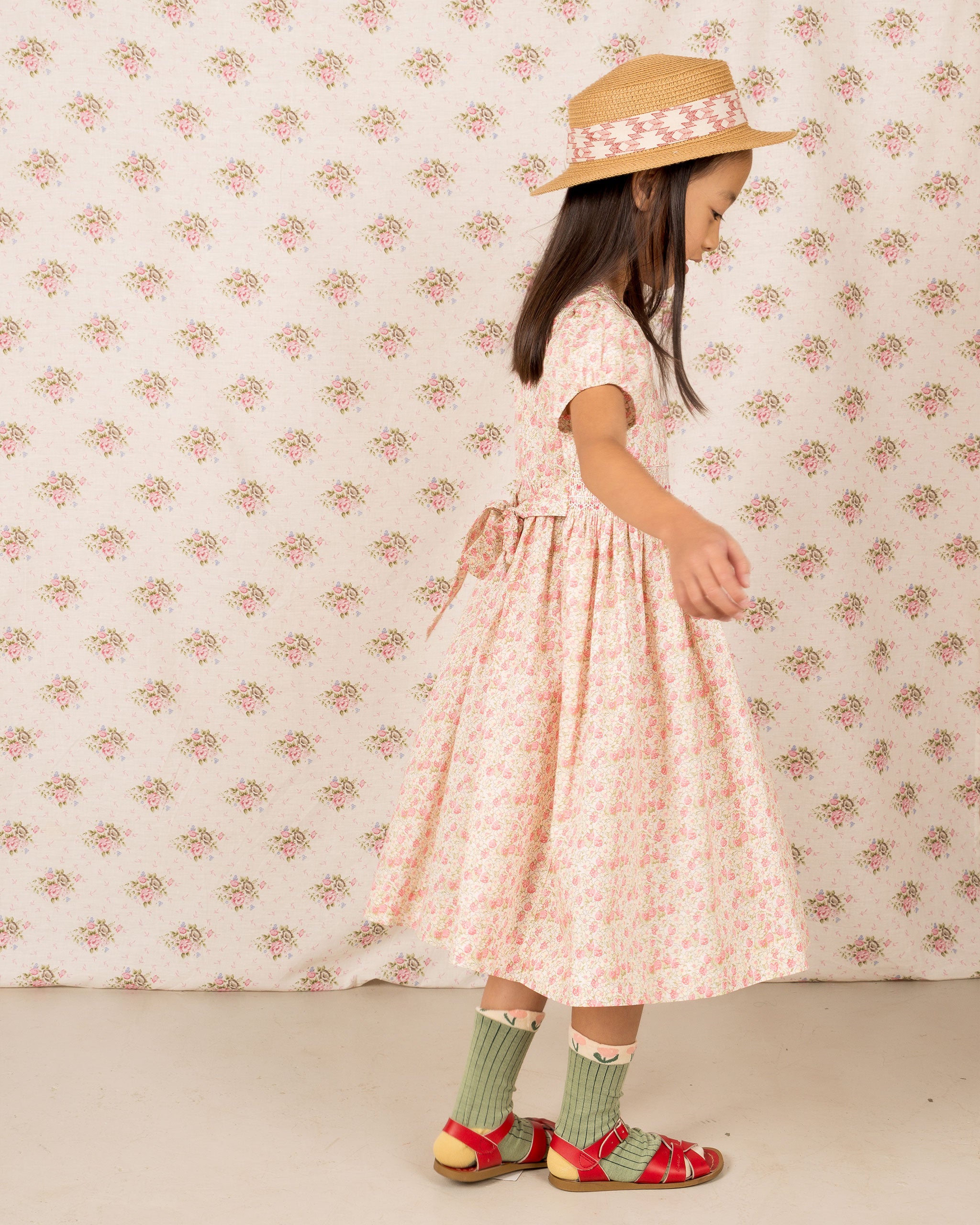 girls wearing strawberry dress, hand-smocked,