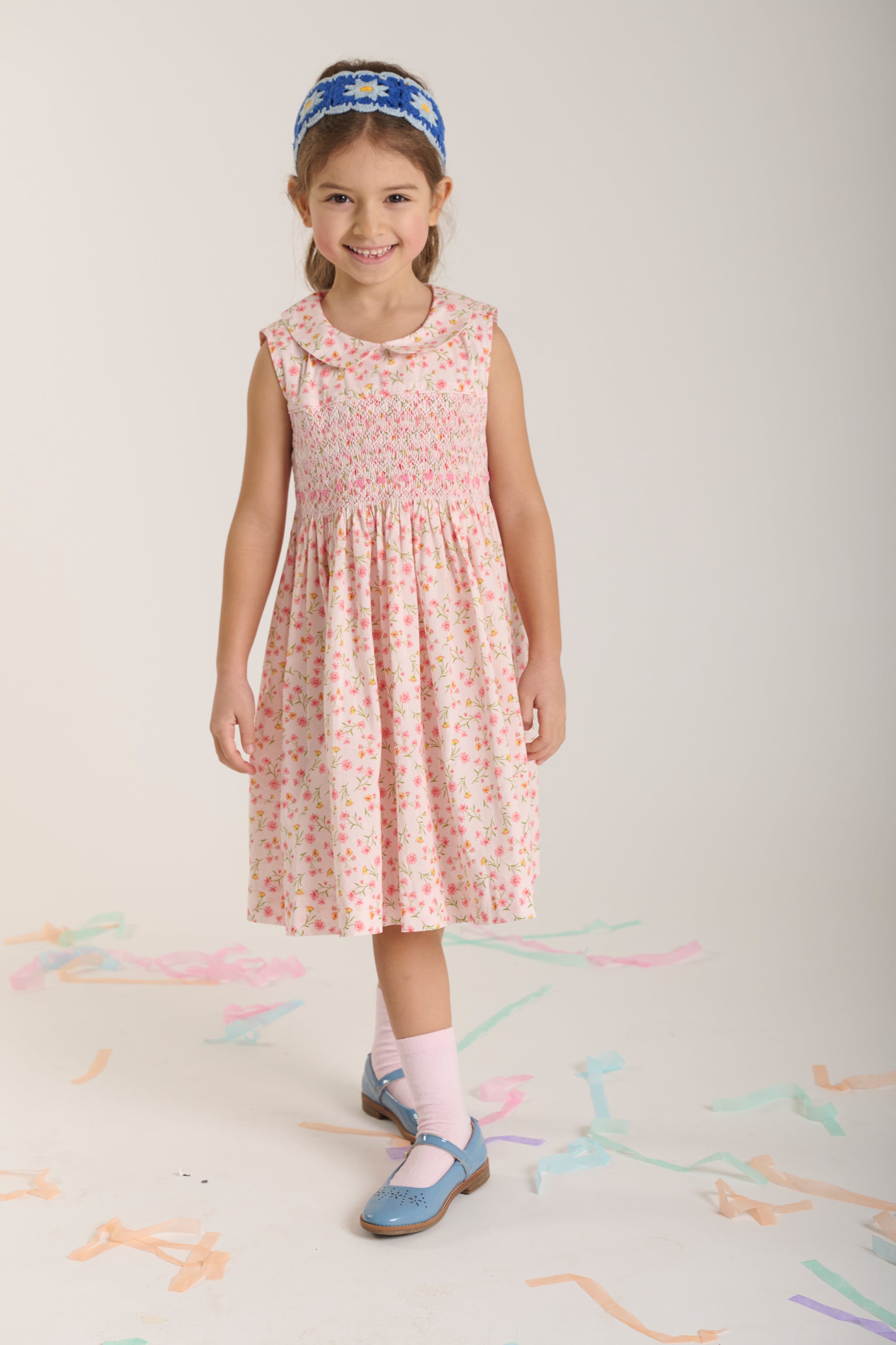 hand-smocked pink summer dress on model