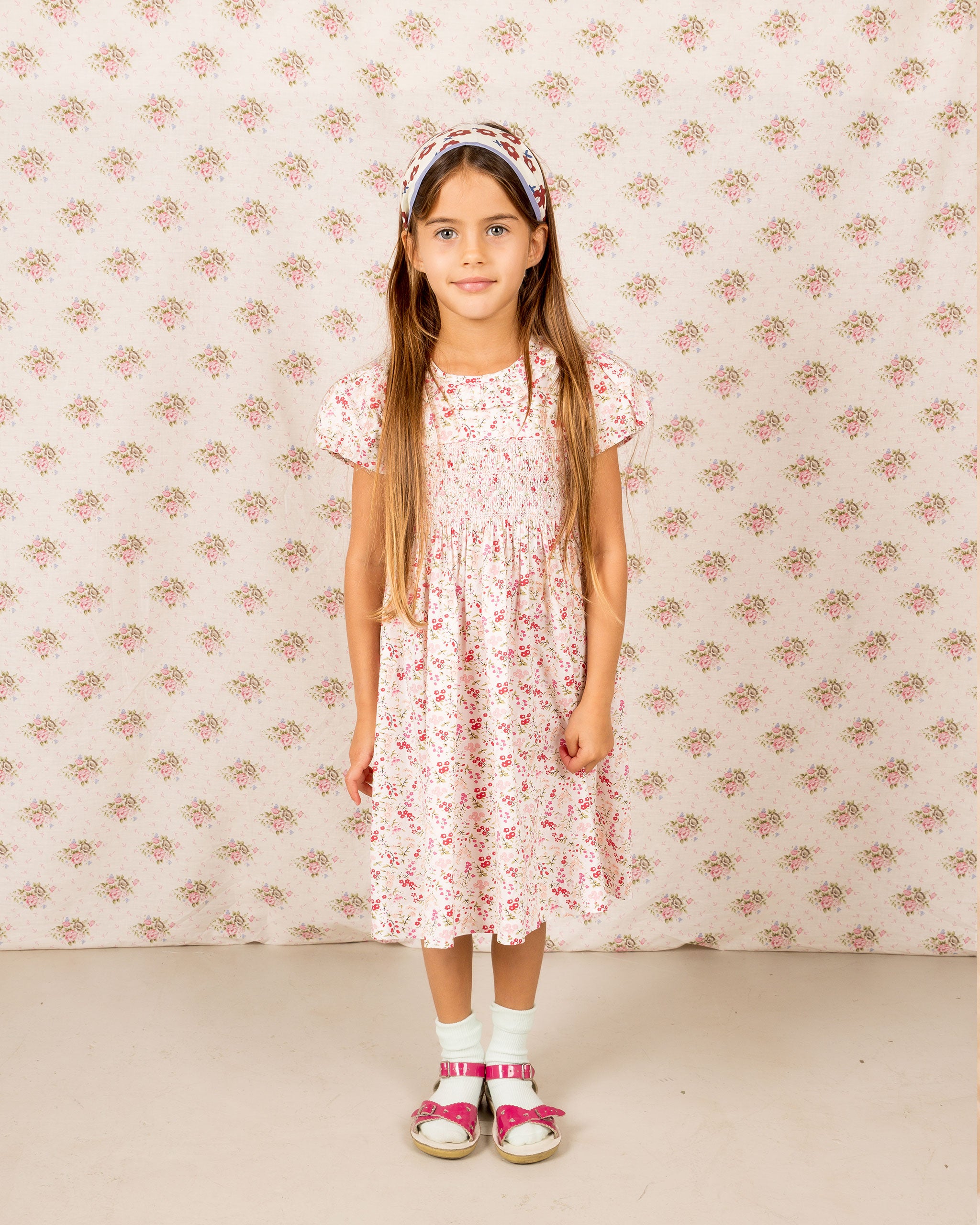 girl in floral smocked dress