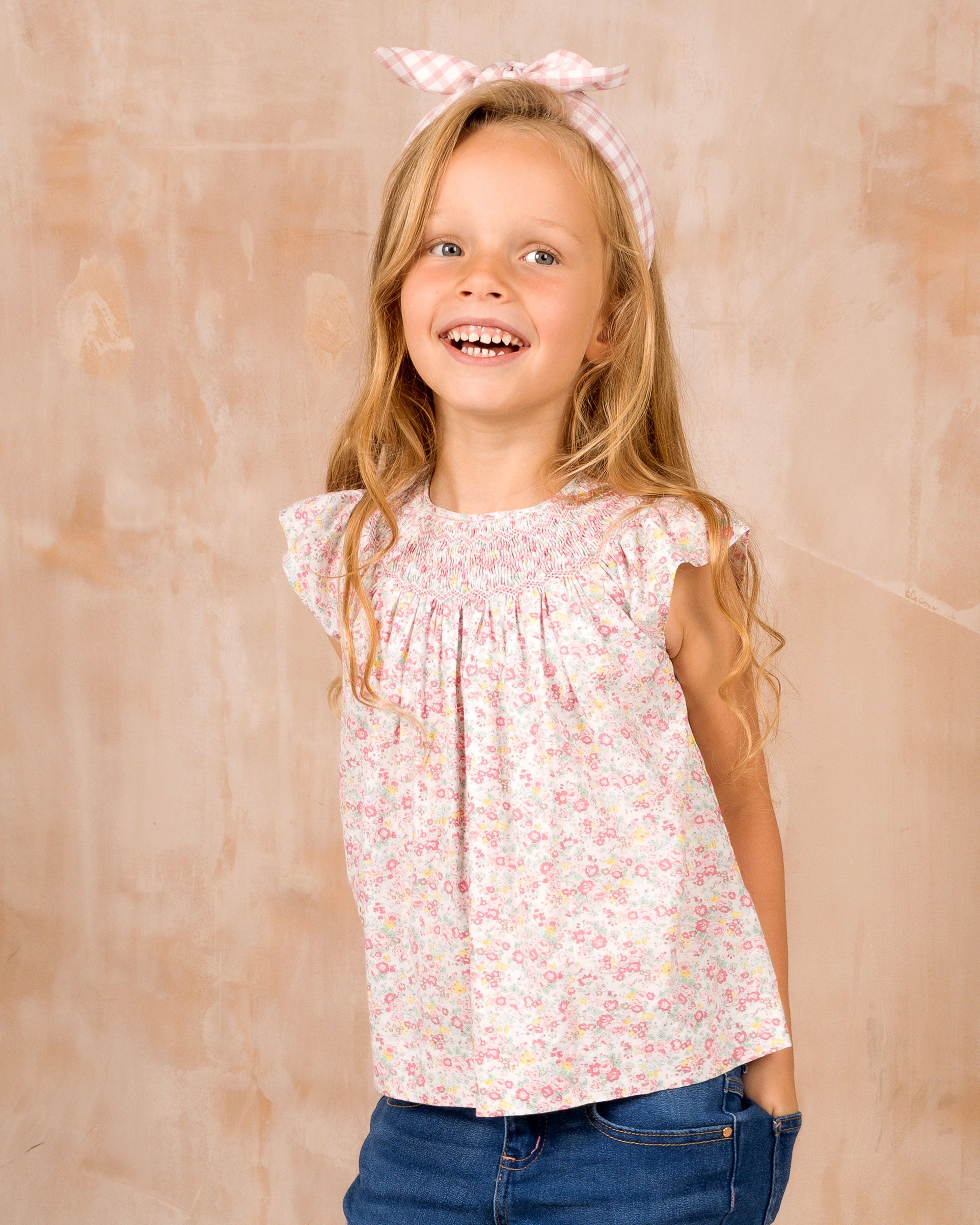 girl in smocked blouse