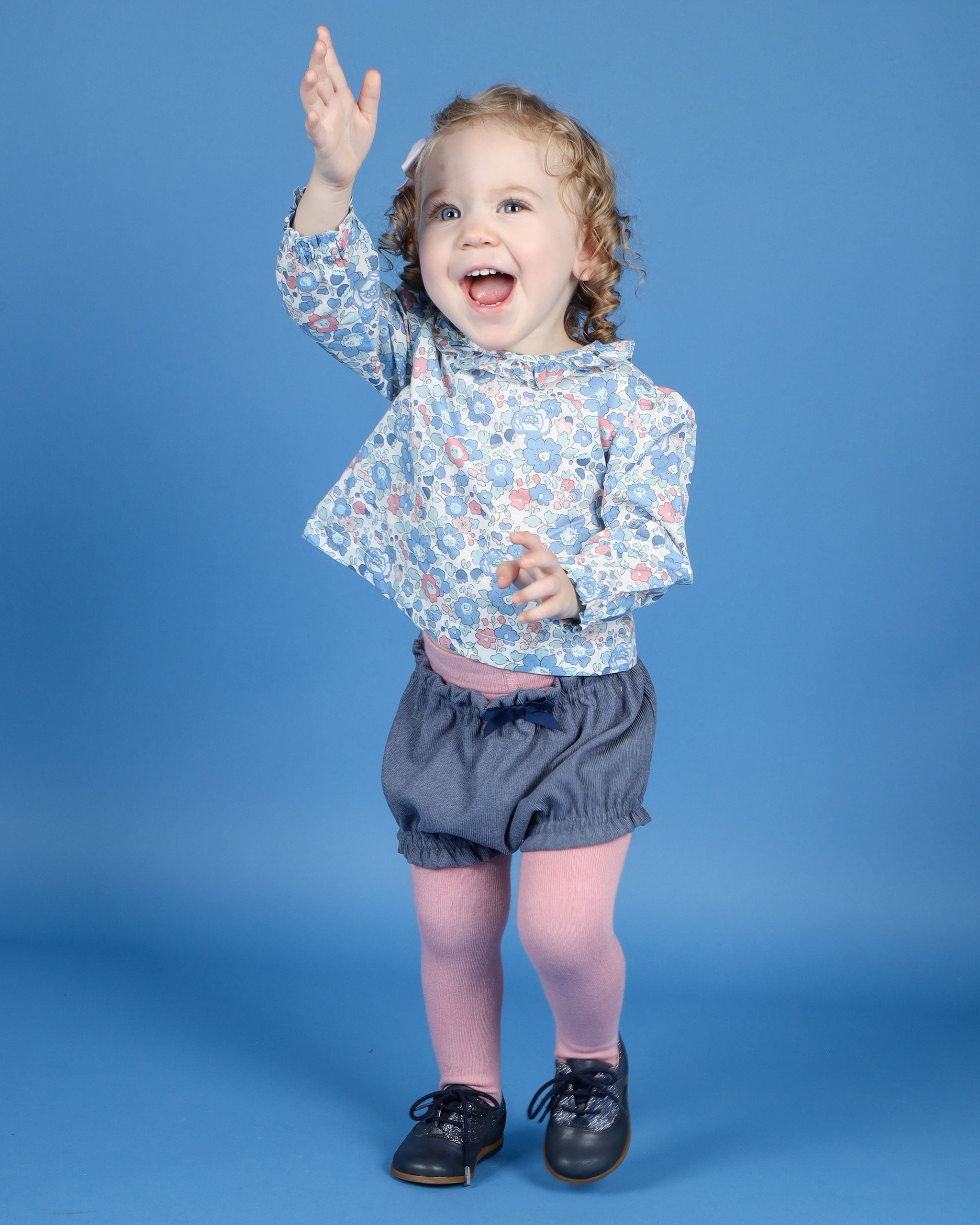 baby in Blouse with frill collar made from Liberty Betsy fabric