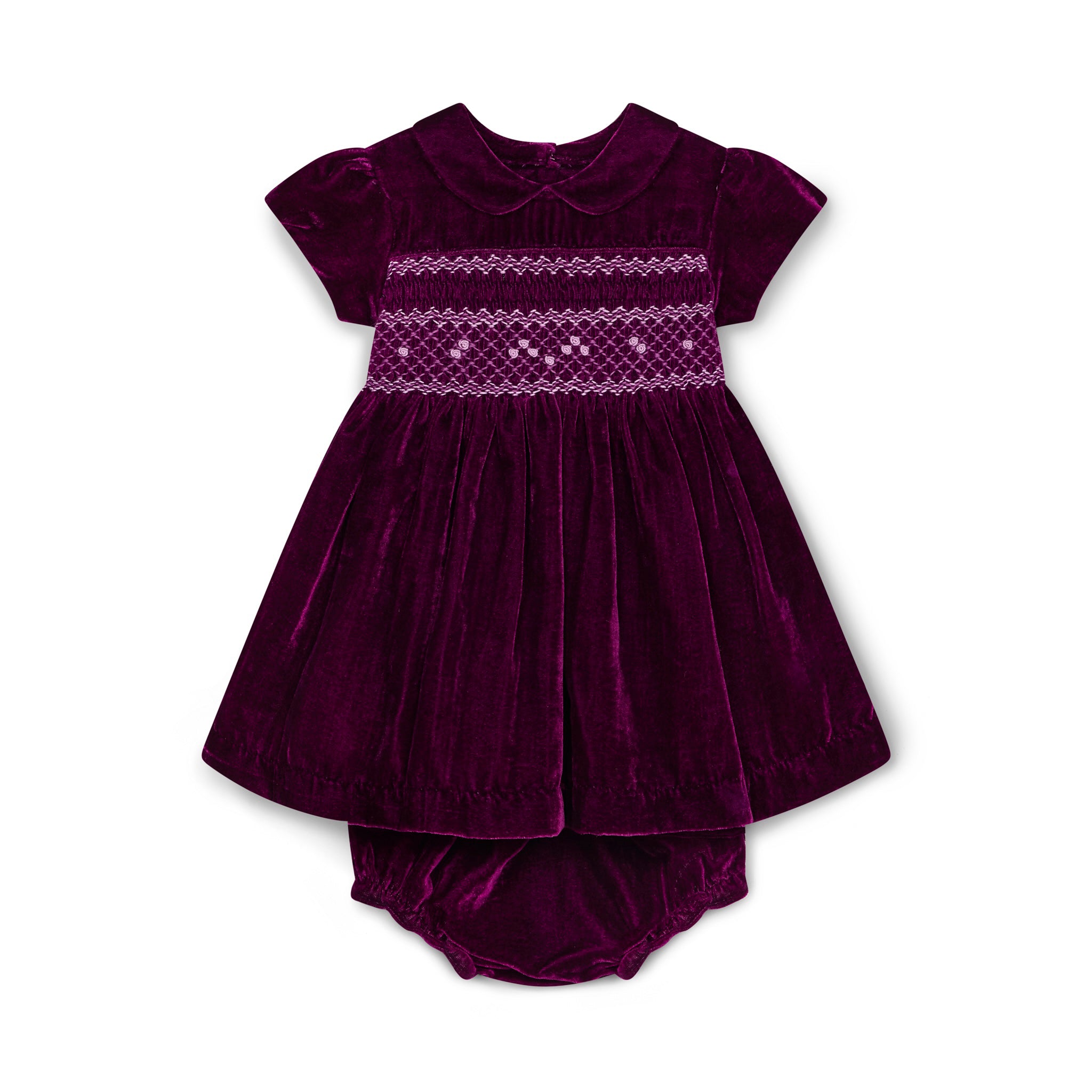 Purple velvet baby dress with smocked details and matching bloomers