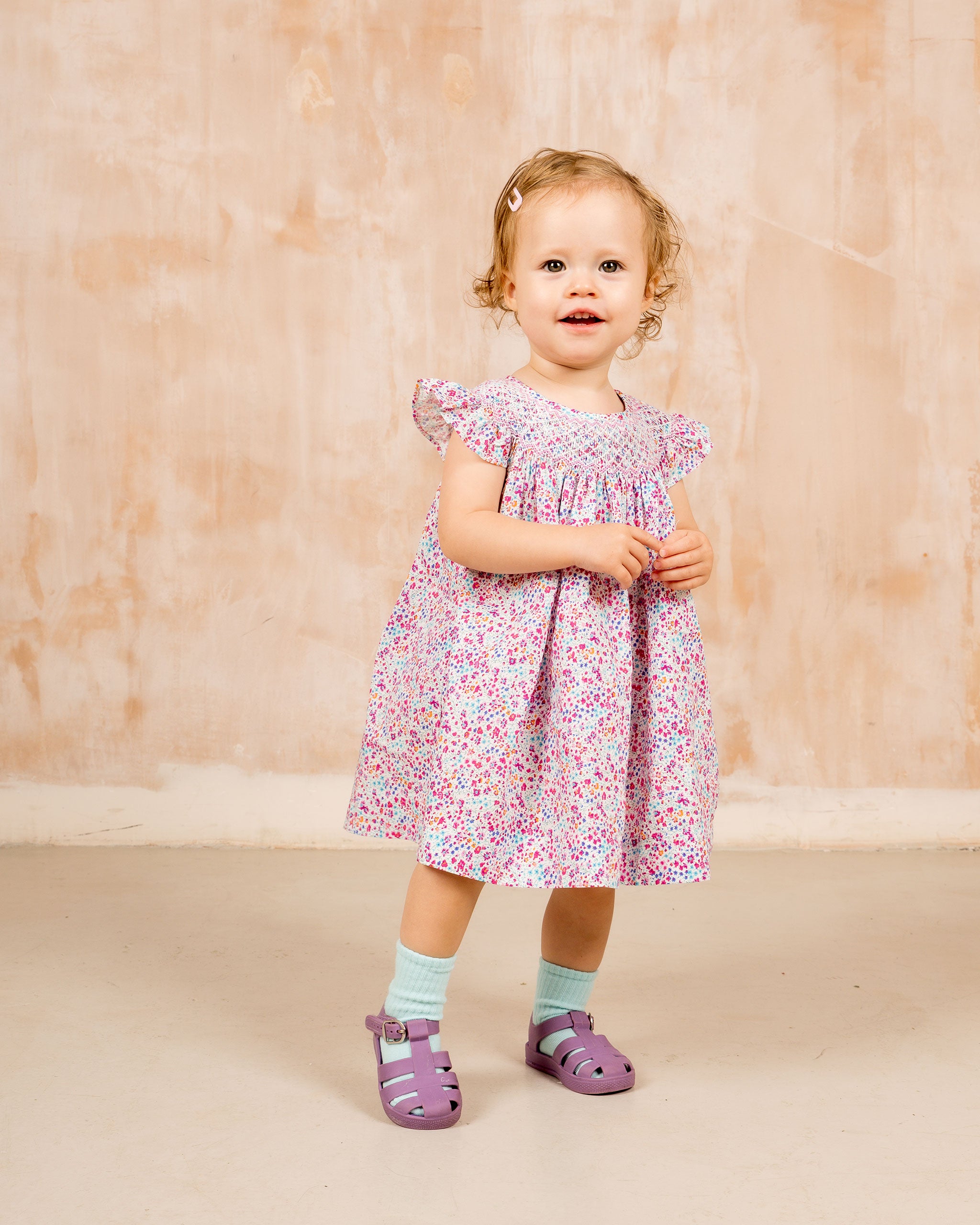 girl in floral mocked dress