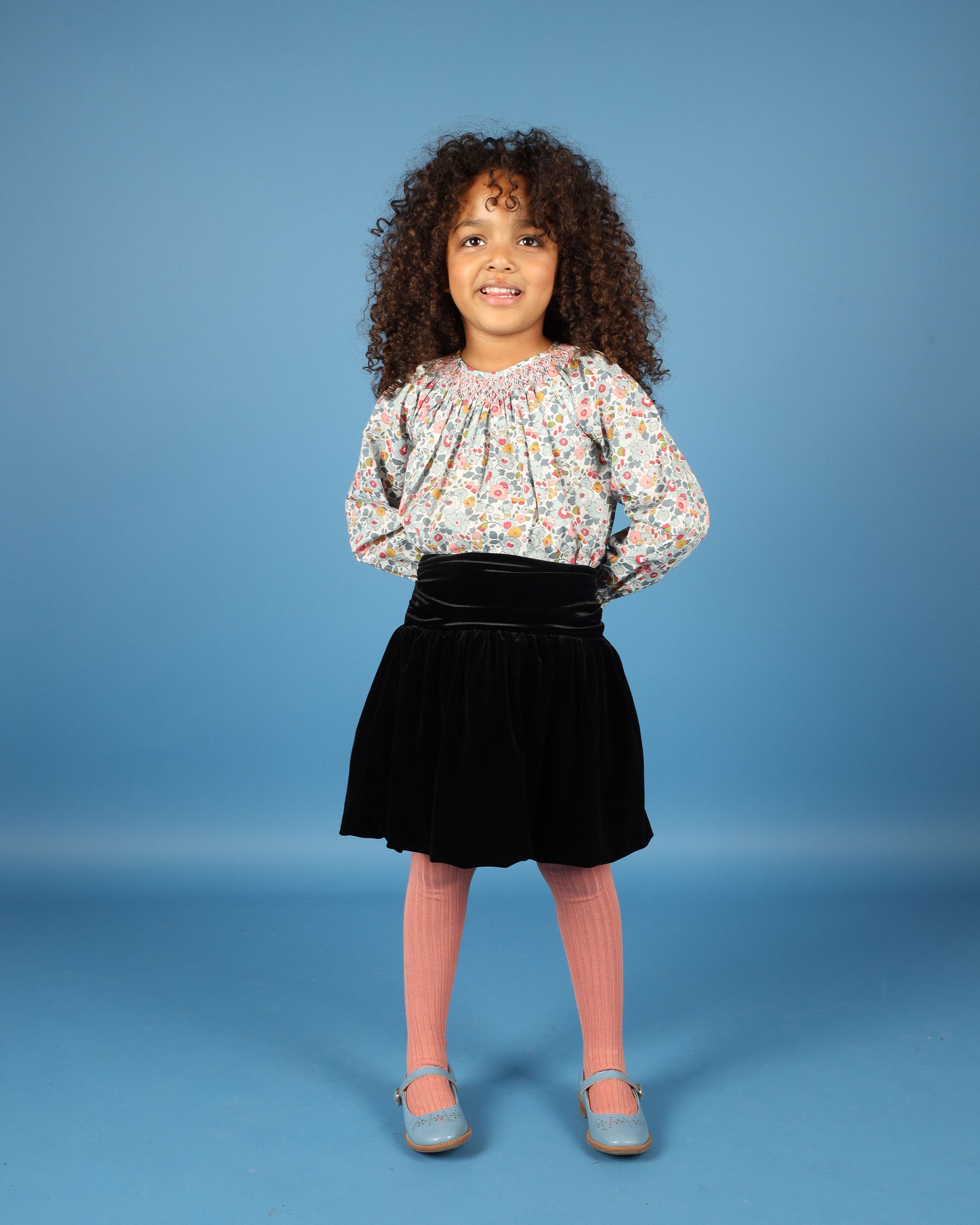 girl model in smocked blouse