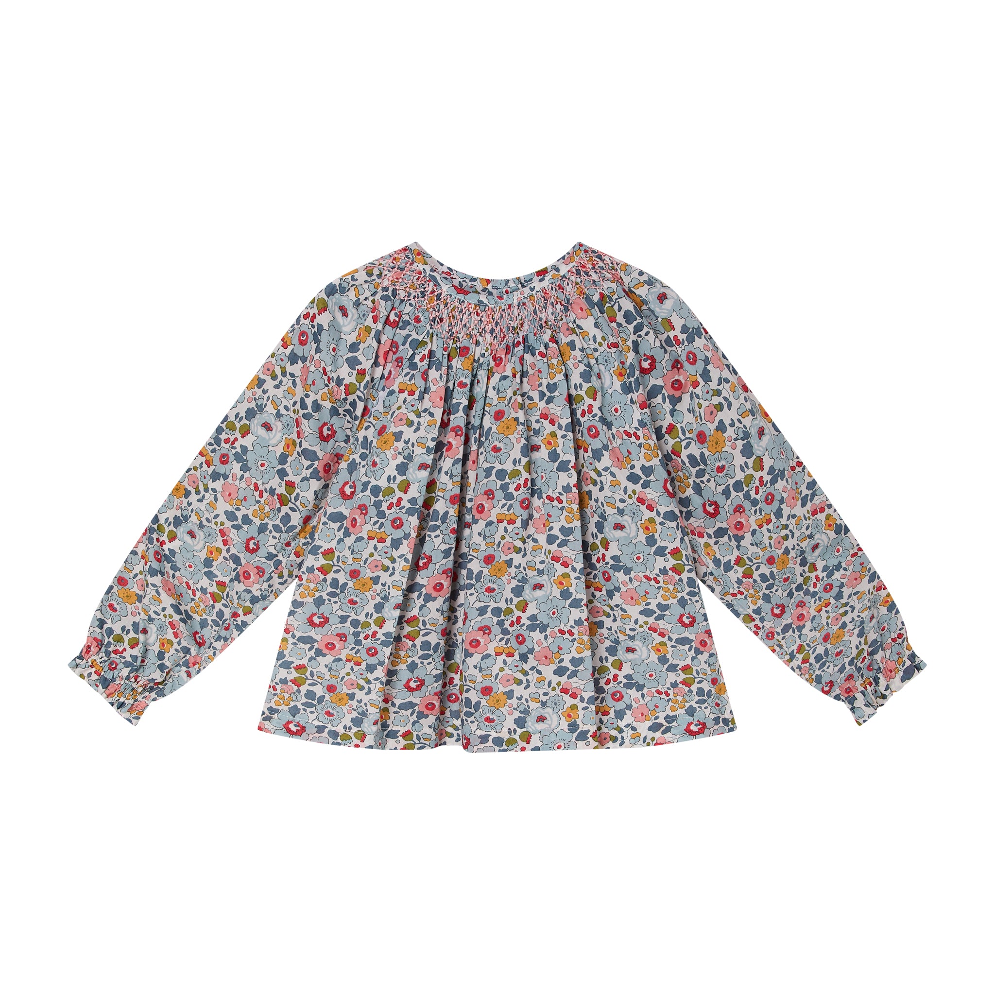 hand-smocked blouse made from Liberty Betsy fabric
