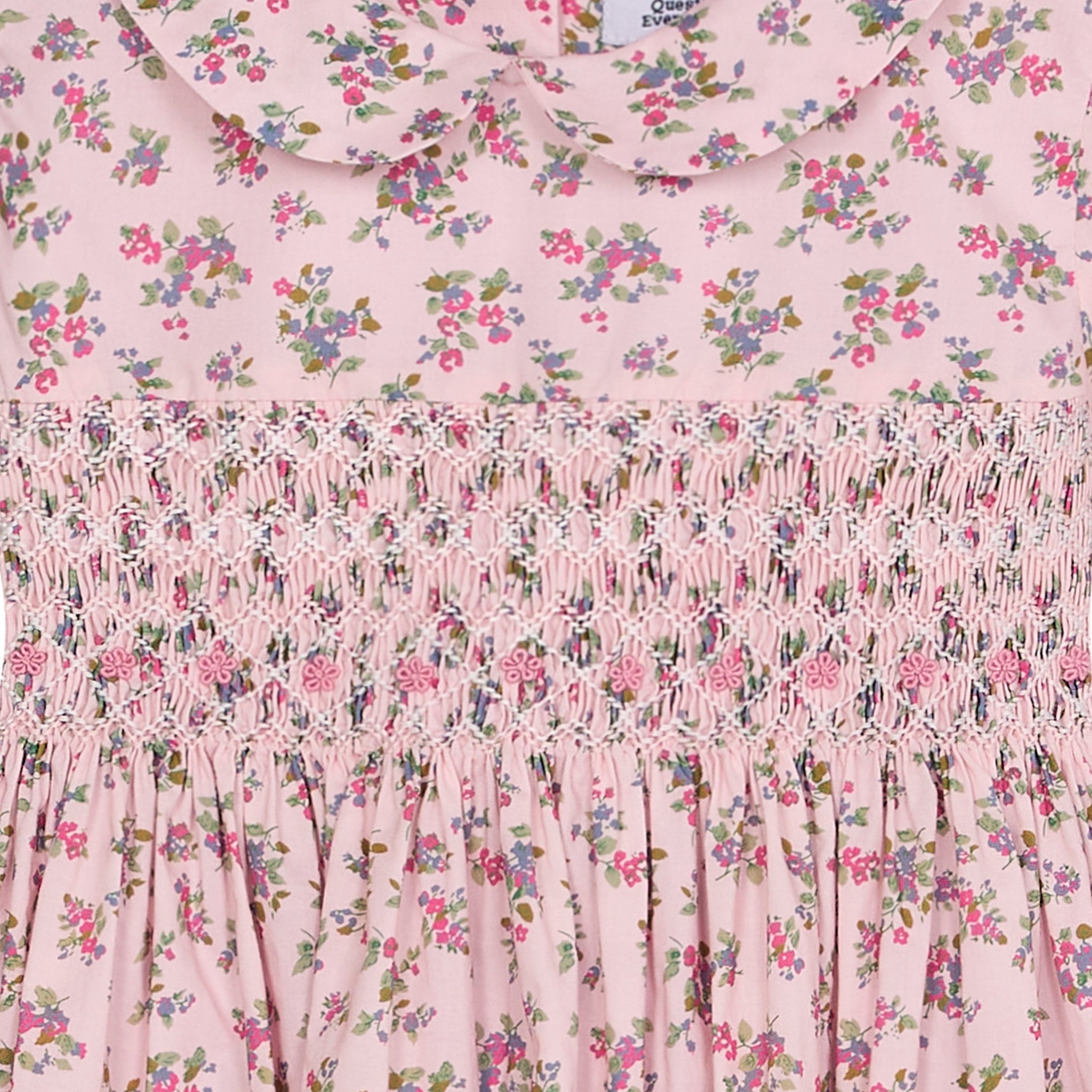 smocking closeup pink dress