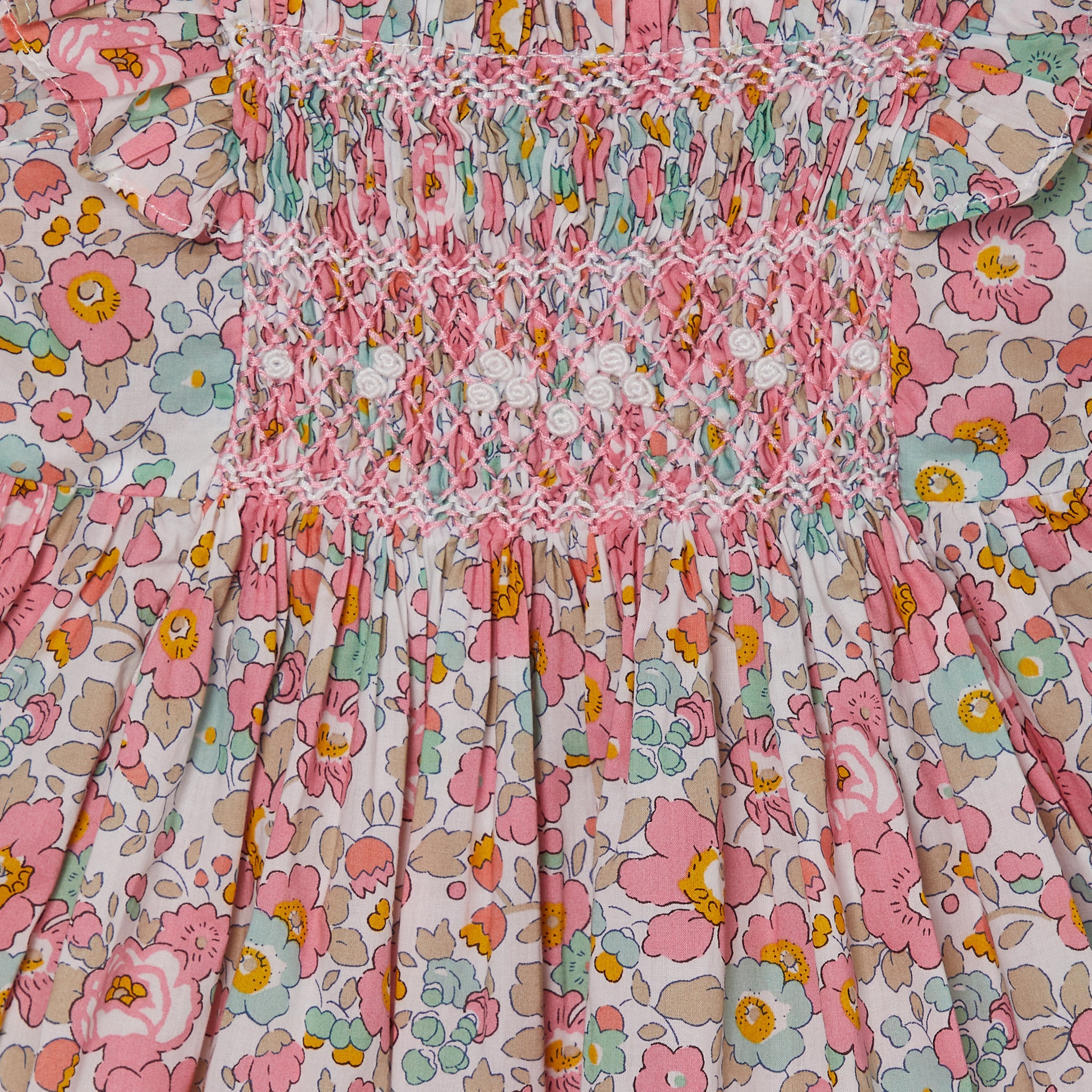baby sundress made from Liberty Betsy fabric, hand-smocked, detail