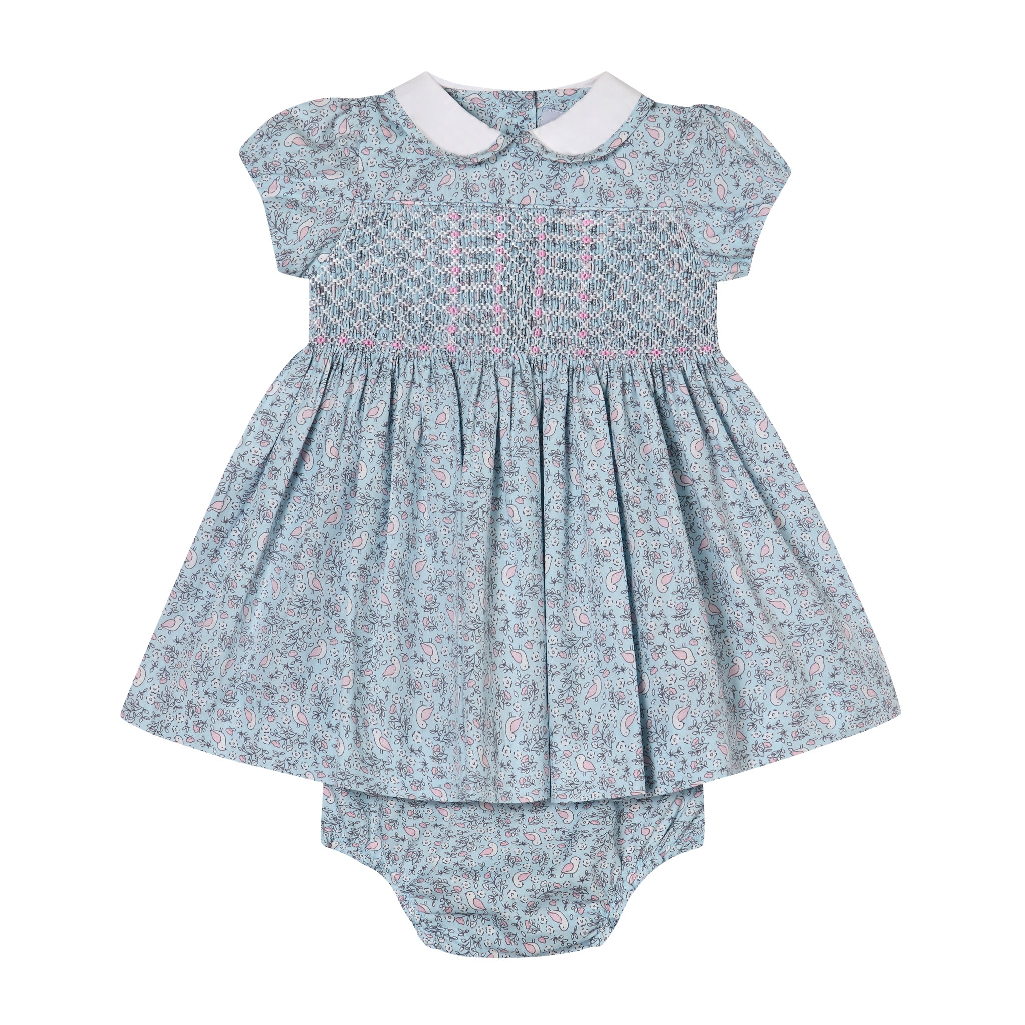 blue hand-smocked baby dress with white collar made from bird print fabric