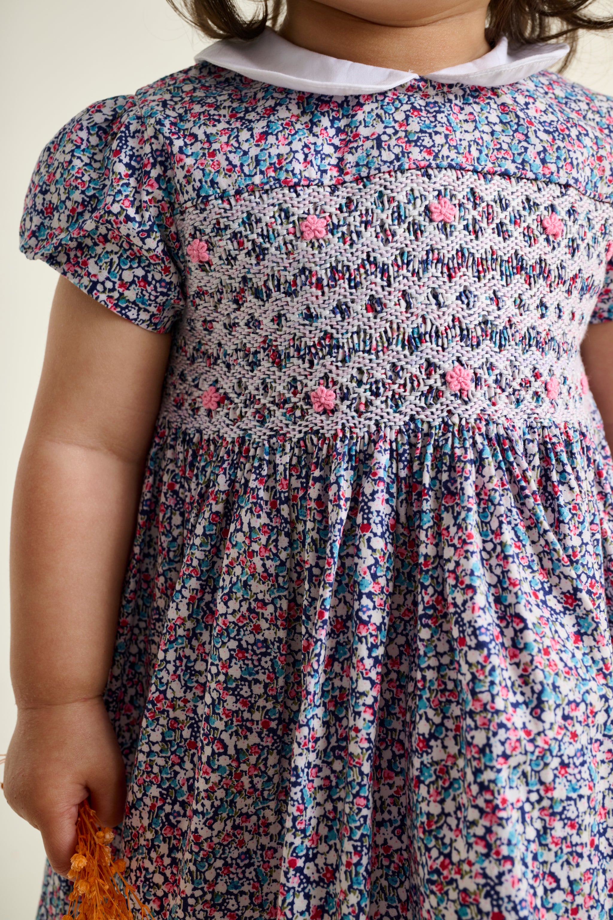 smocking closeup floral baby and toddler dress