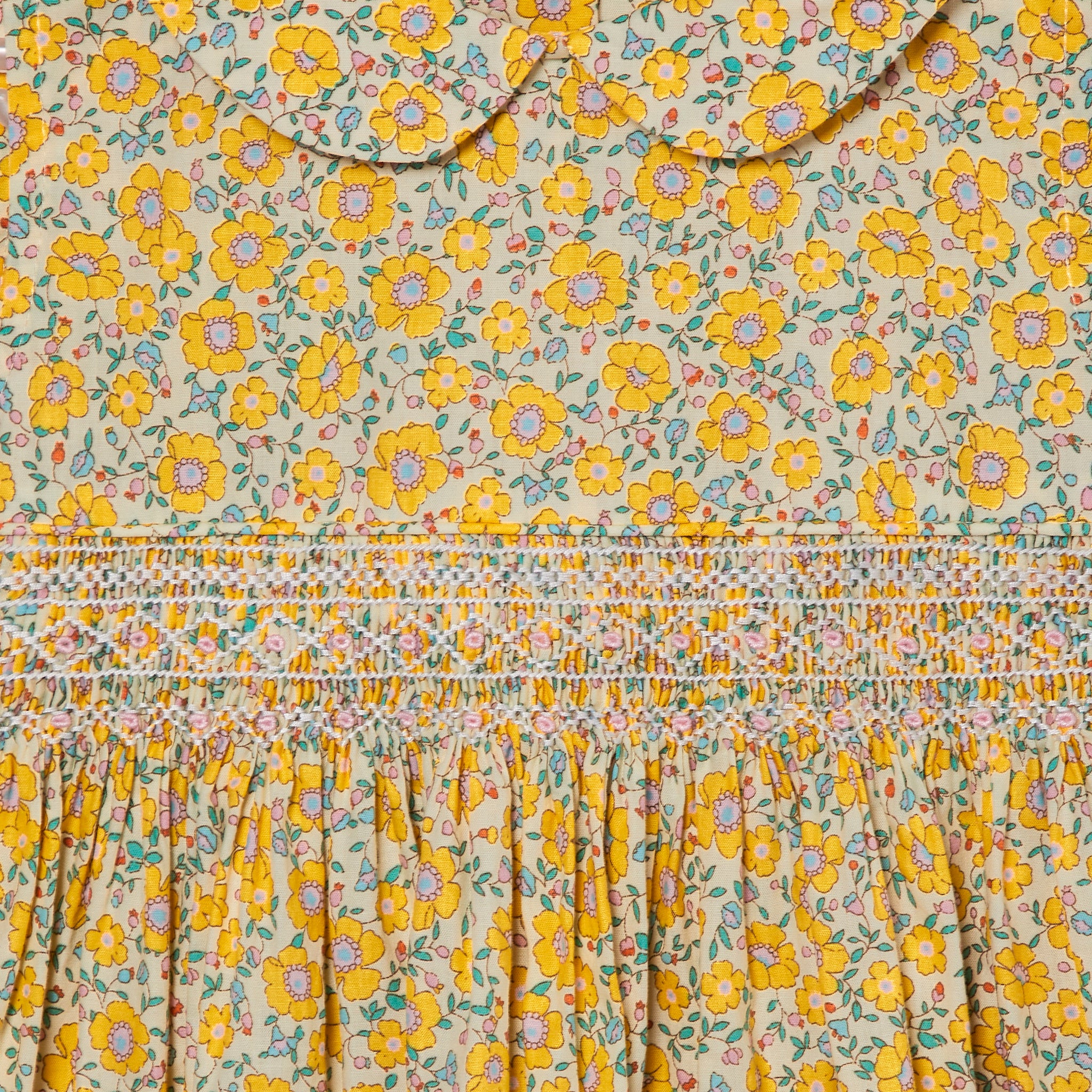 smocking detail, yellow floral dress
