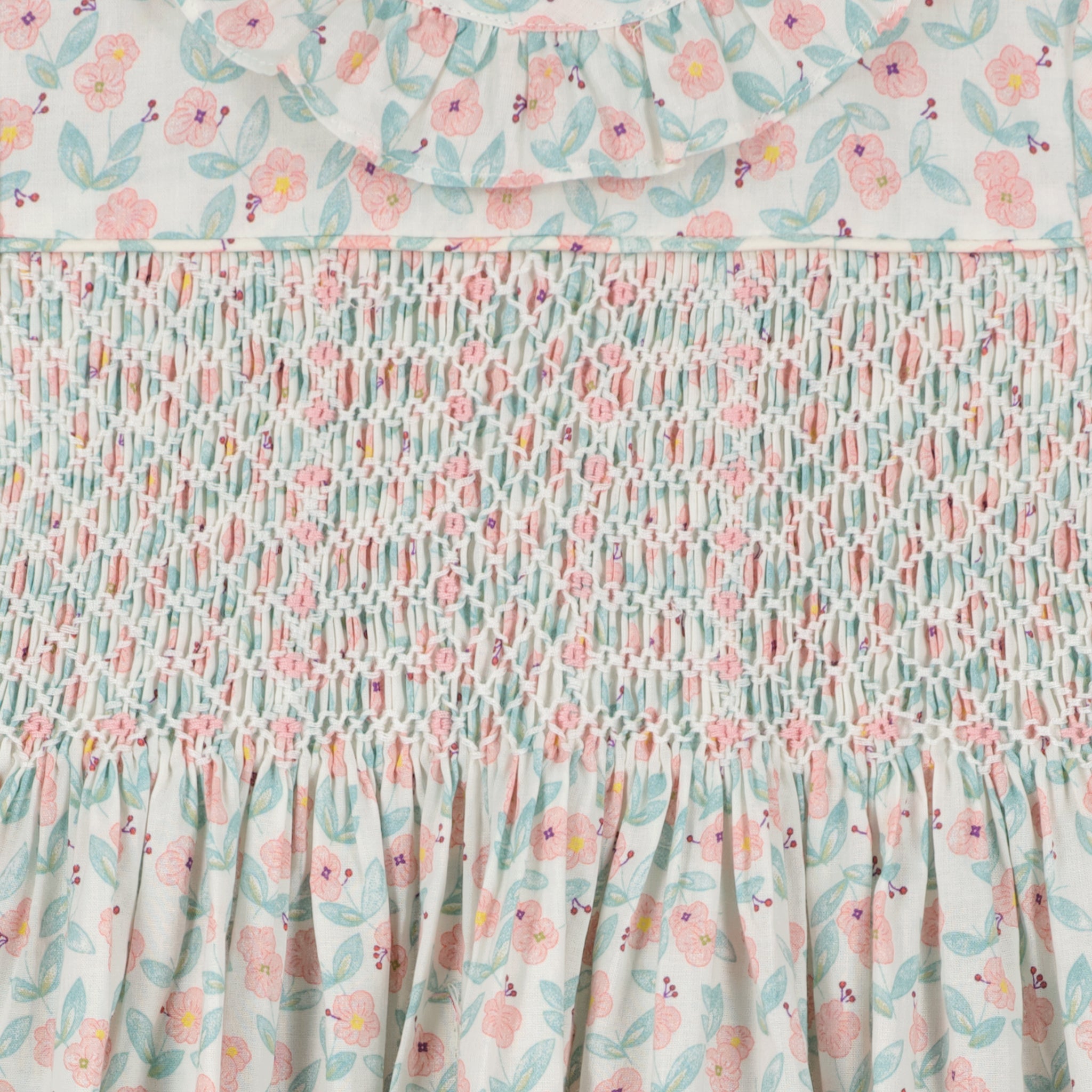 smocked floral baby dress with frill collar, smocking detail