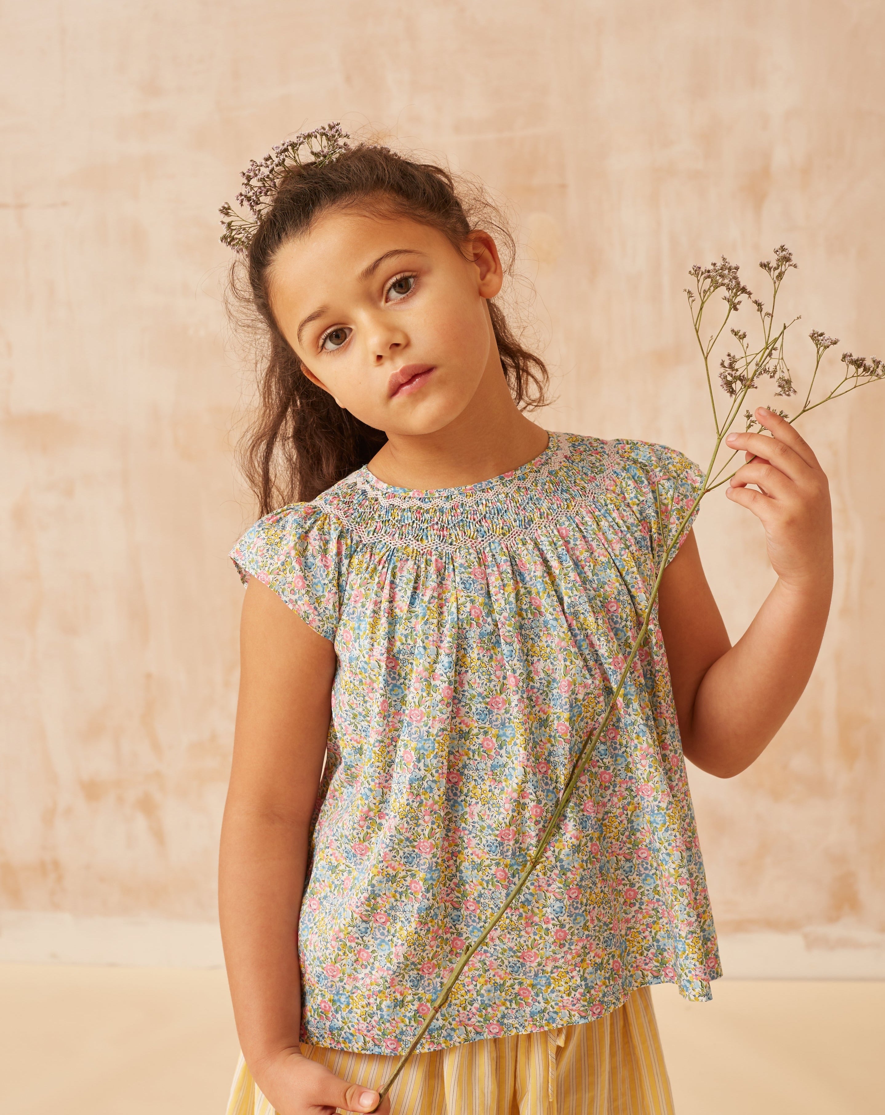 girl in Liberty print blouse