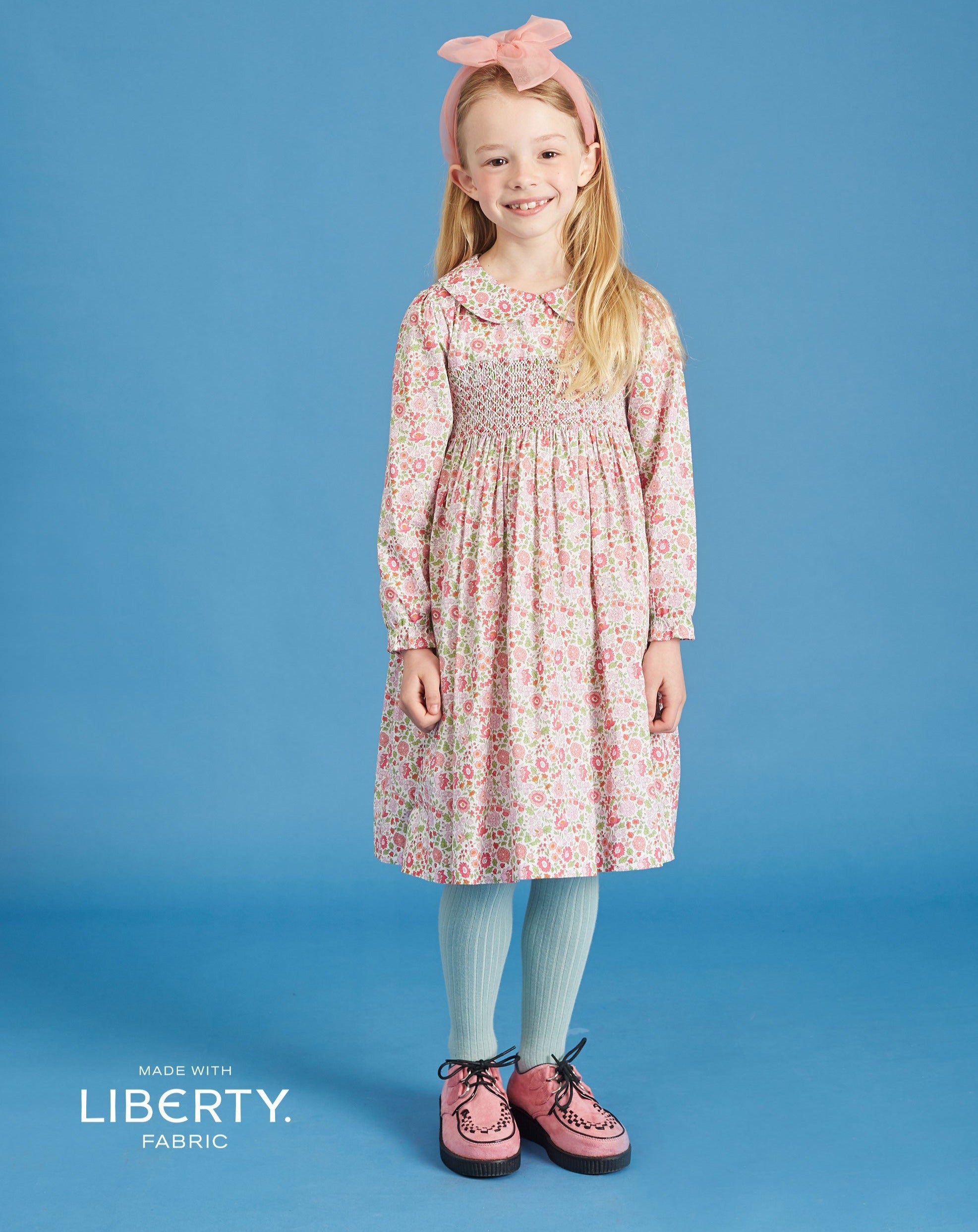 girl in floral Liberty print dress