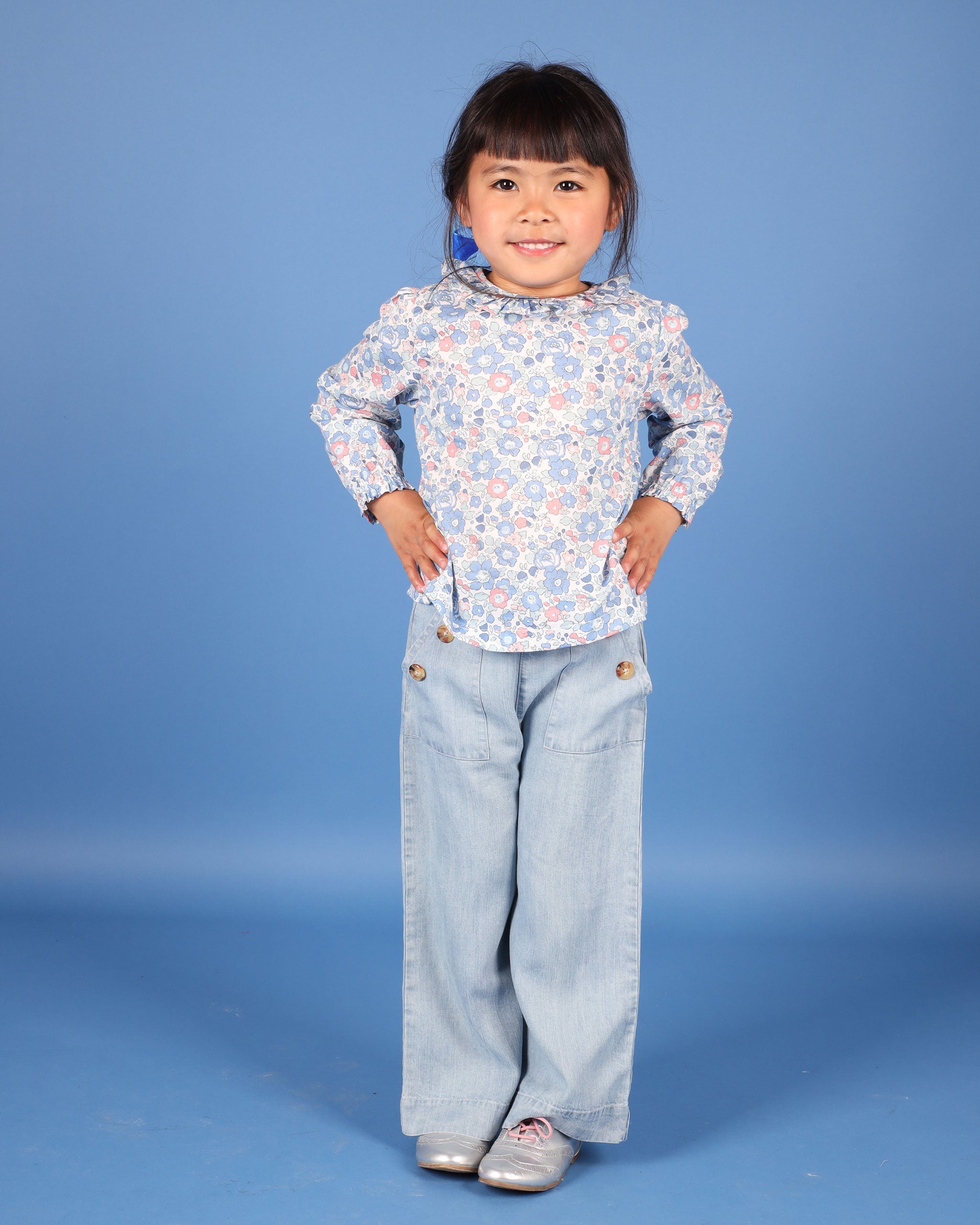 girl in blue floral blouse, Liberty Betsy fabric