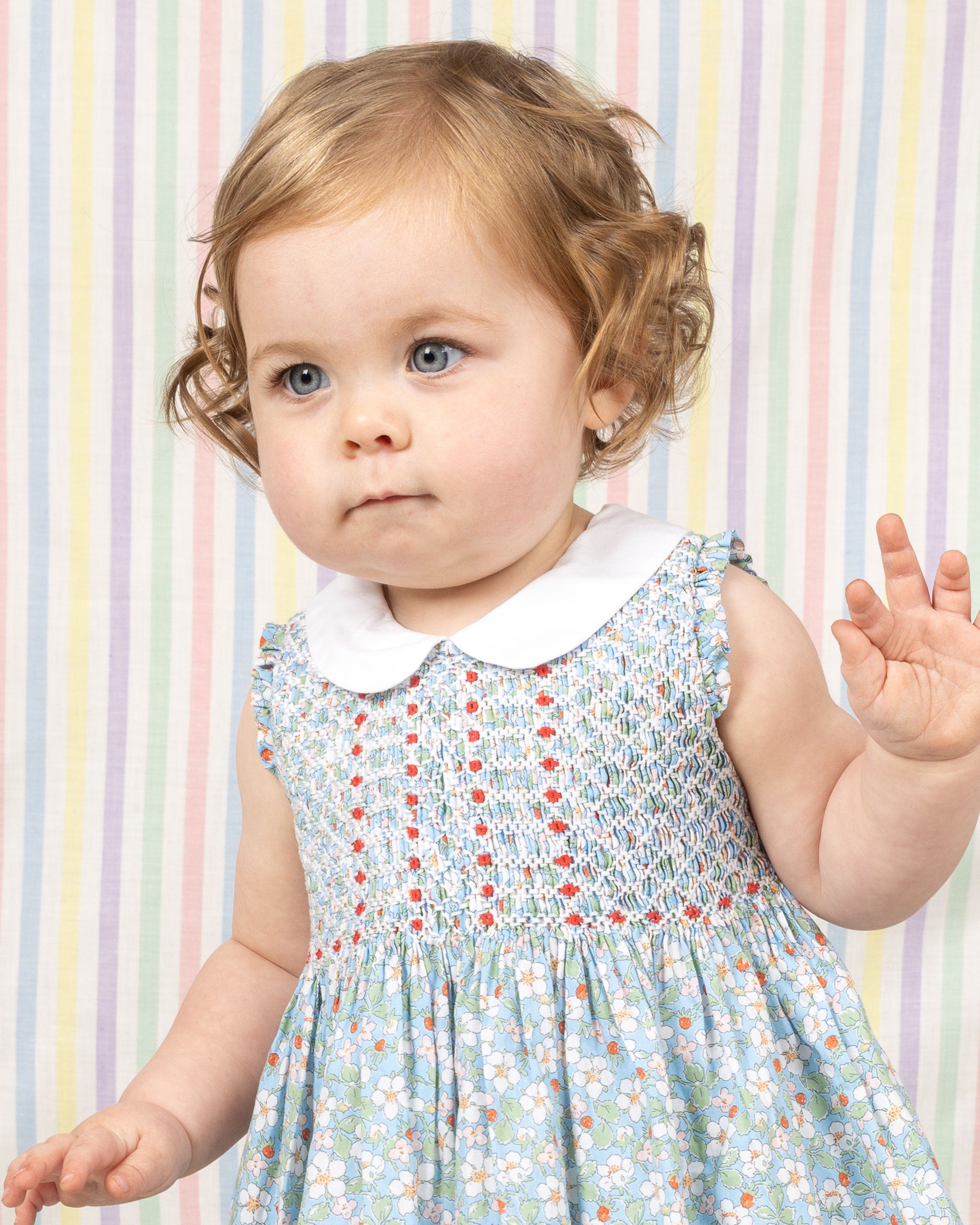 closeup, smocked strawberry dress made from Liberty fabric 