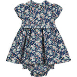 hand-smocked floral baby dress with bloomers, back
