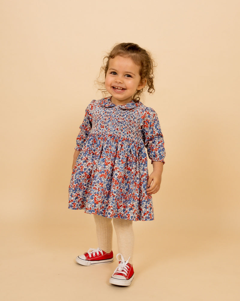 baby in smocked dress made from Liberty fabric
