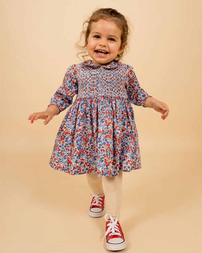 toddler girl in hand-smocked Liberty fabric  dress