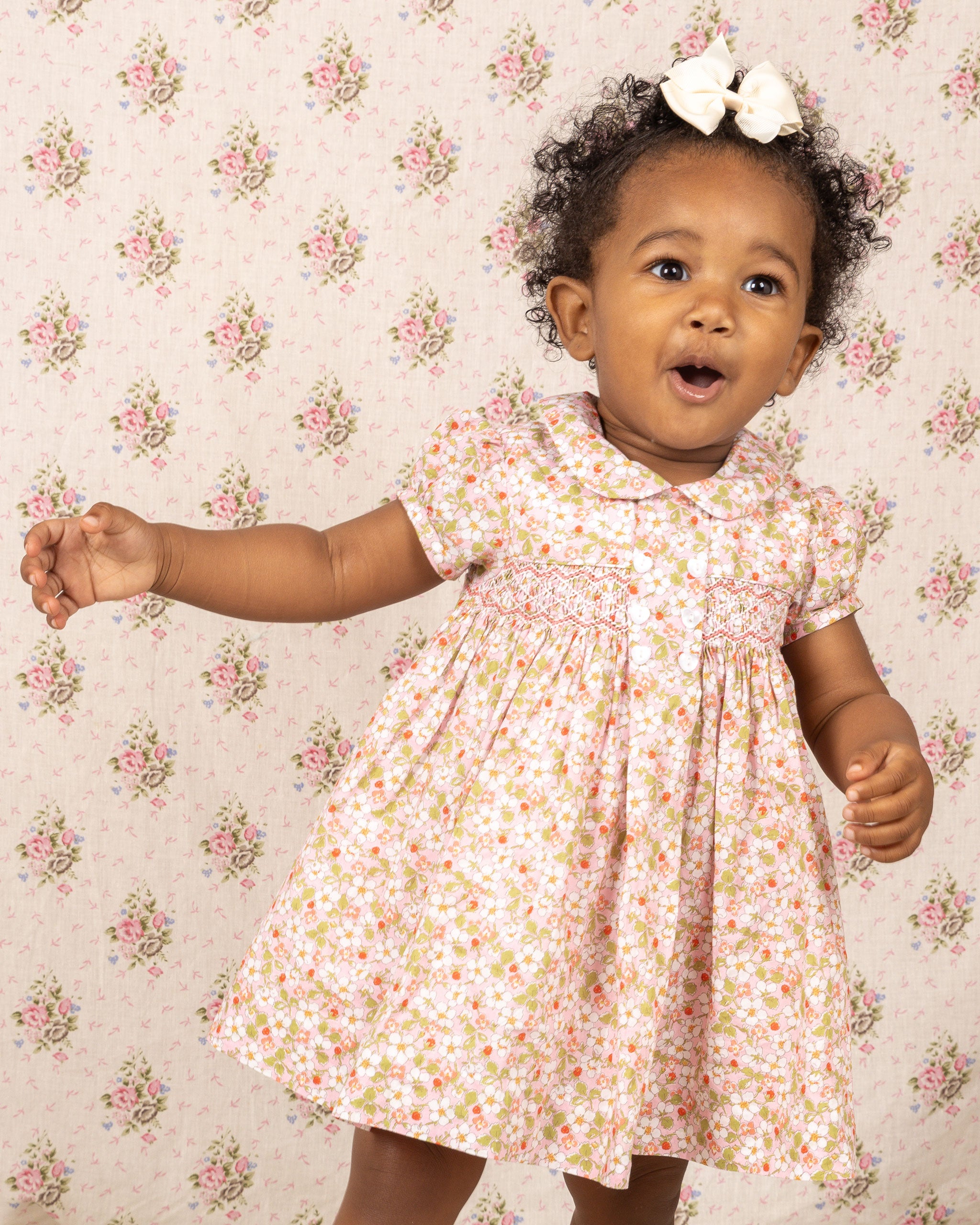 baby in Liberty strawberry blossom dress
