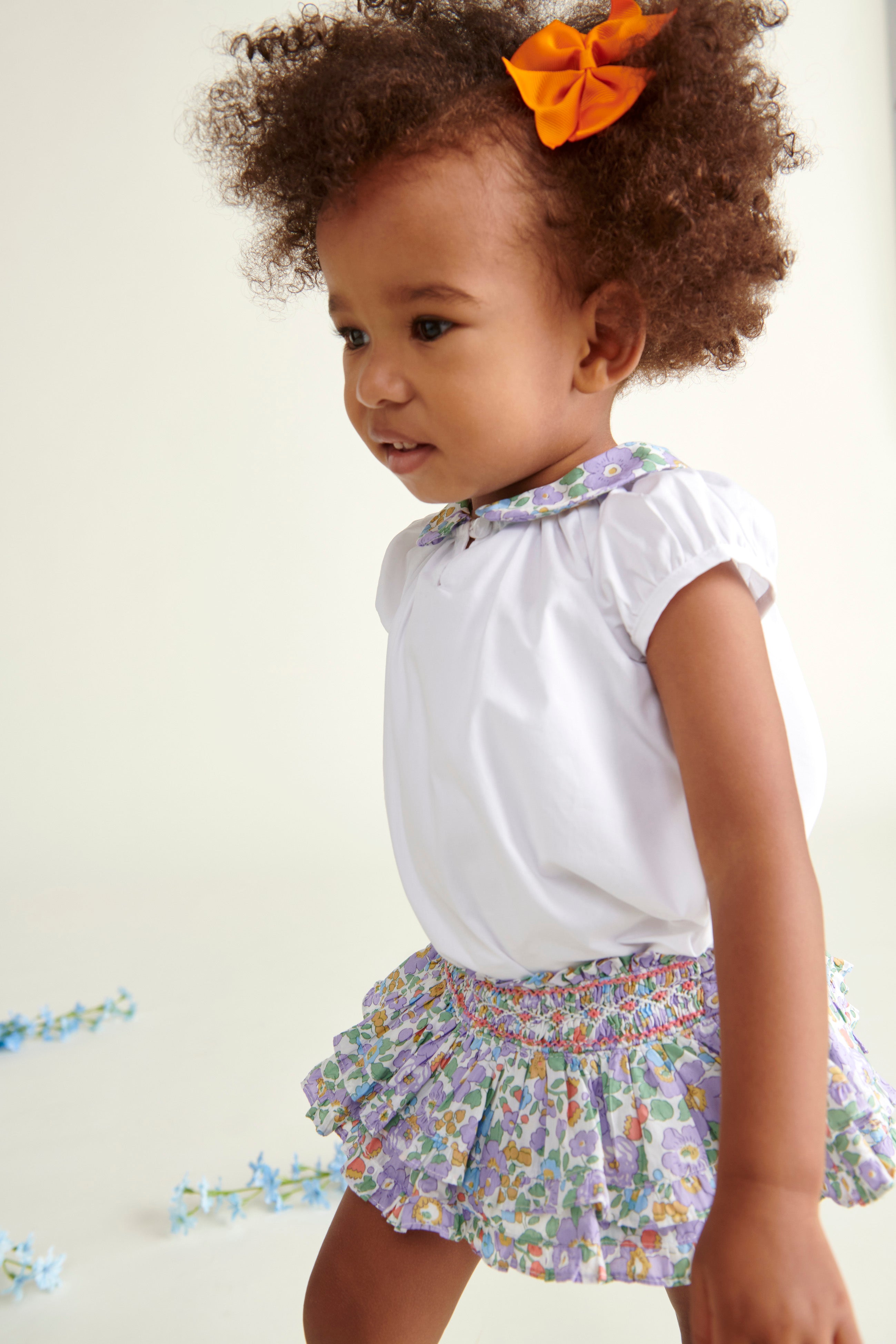 toddler girl in blouse and matching skort 