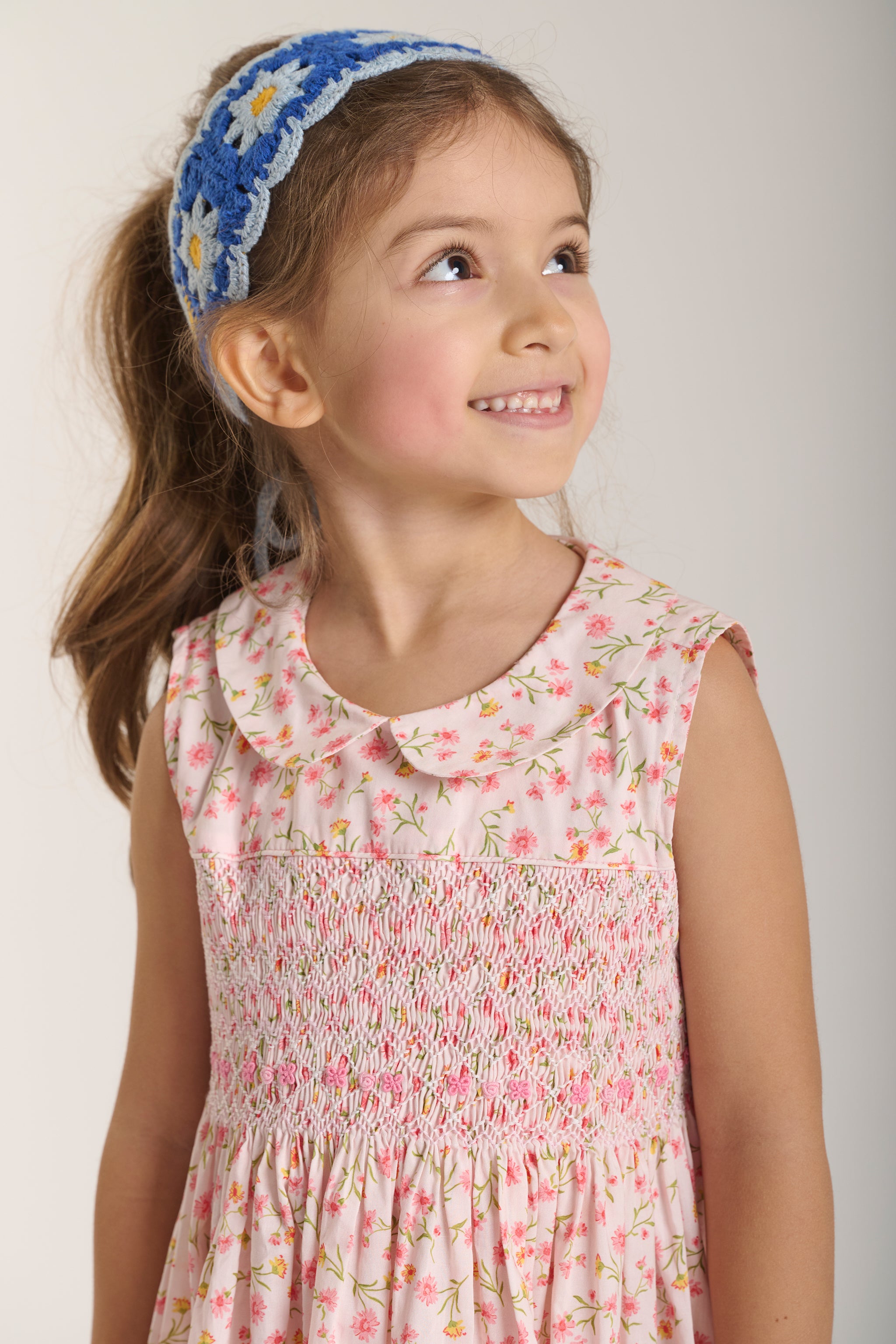 girl in pink floral dress
