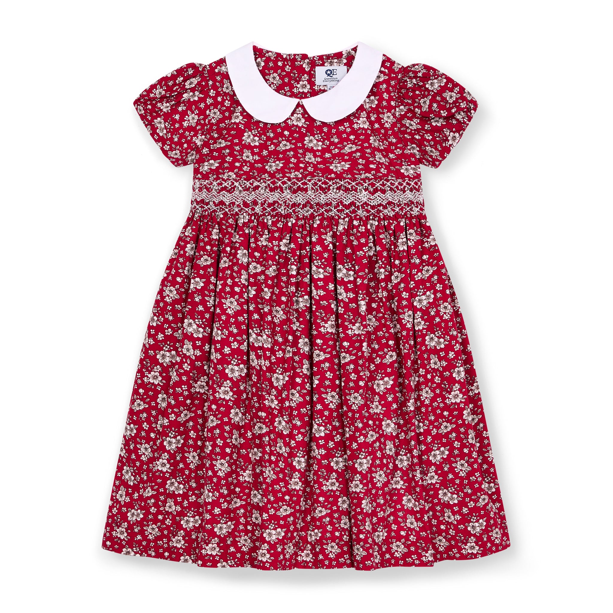 Hand-Smocked Red floral dress with white collar on a white background