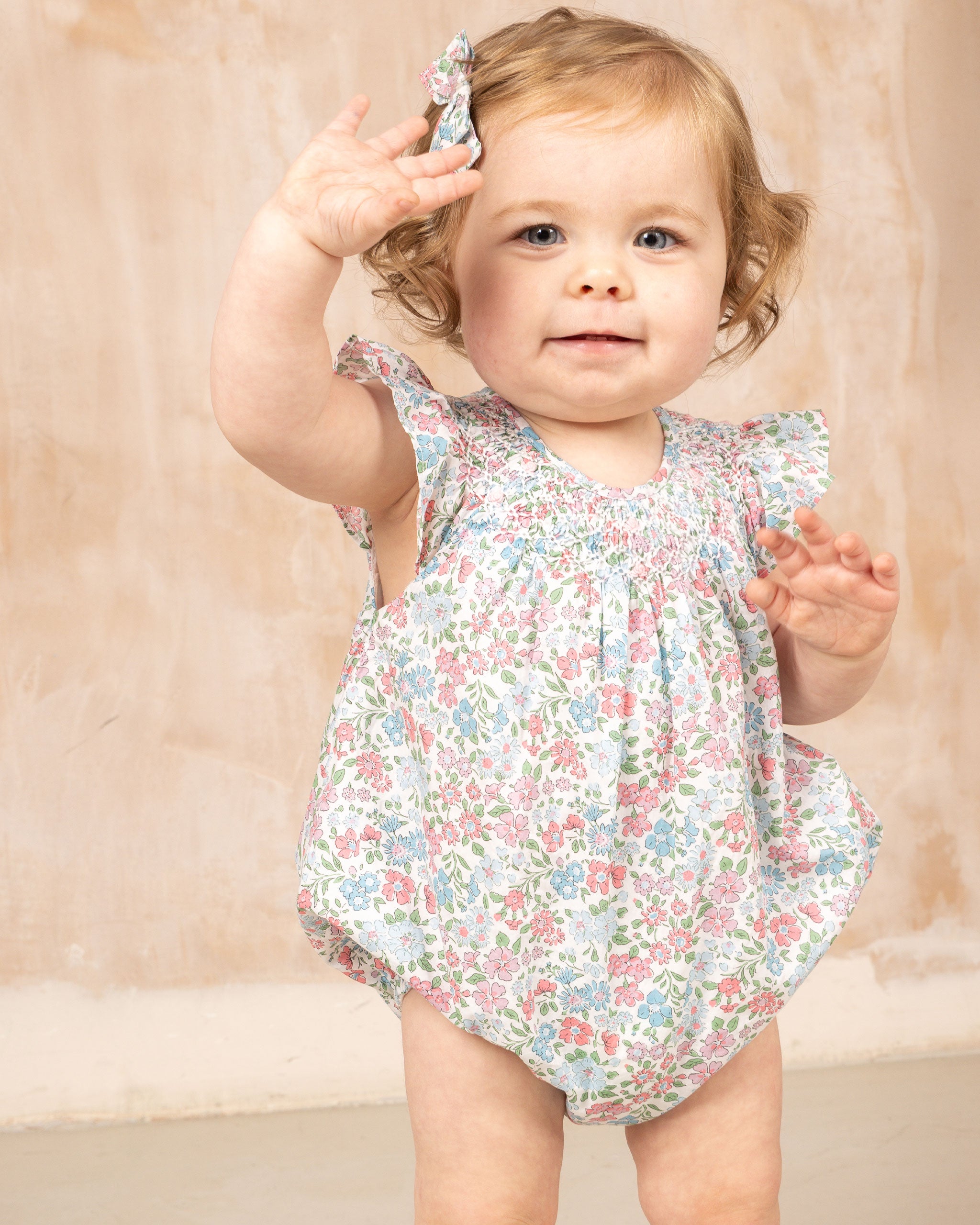 baby waving