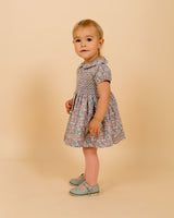 toddler girl in hand-smocked dress