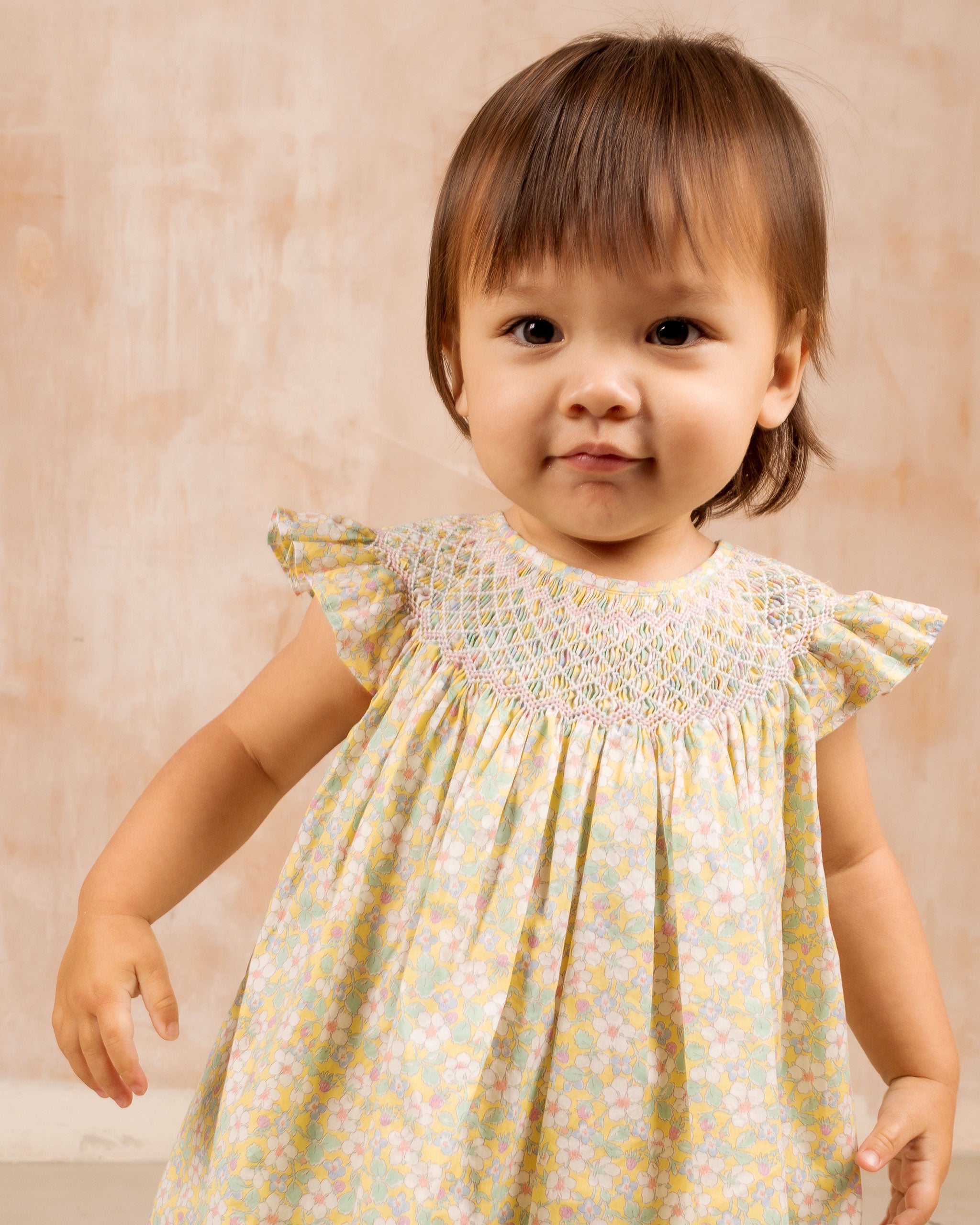 toddler in Liberty print summer dress