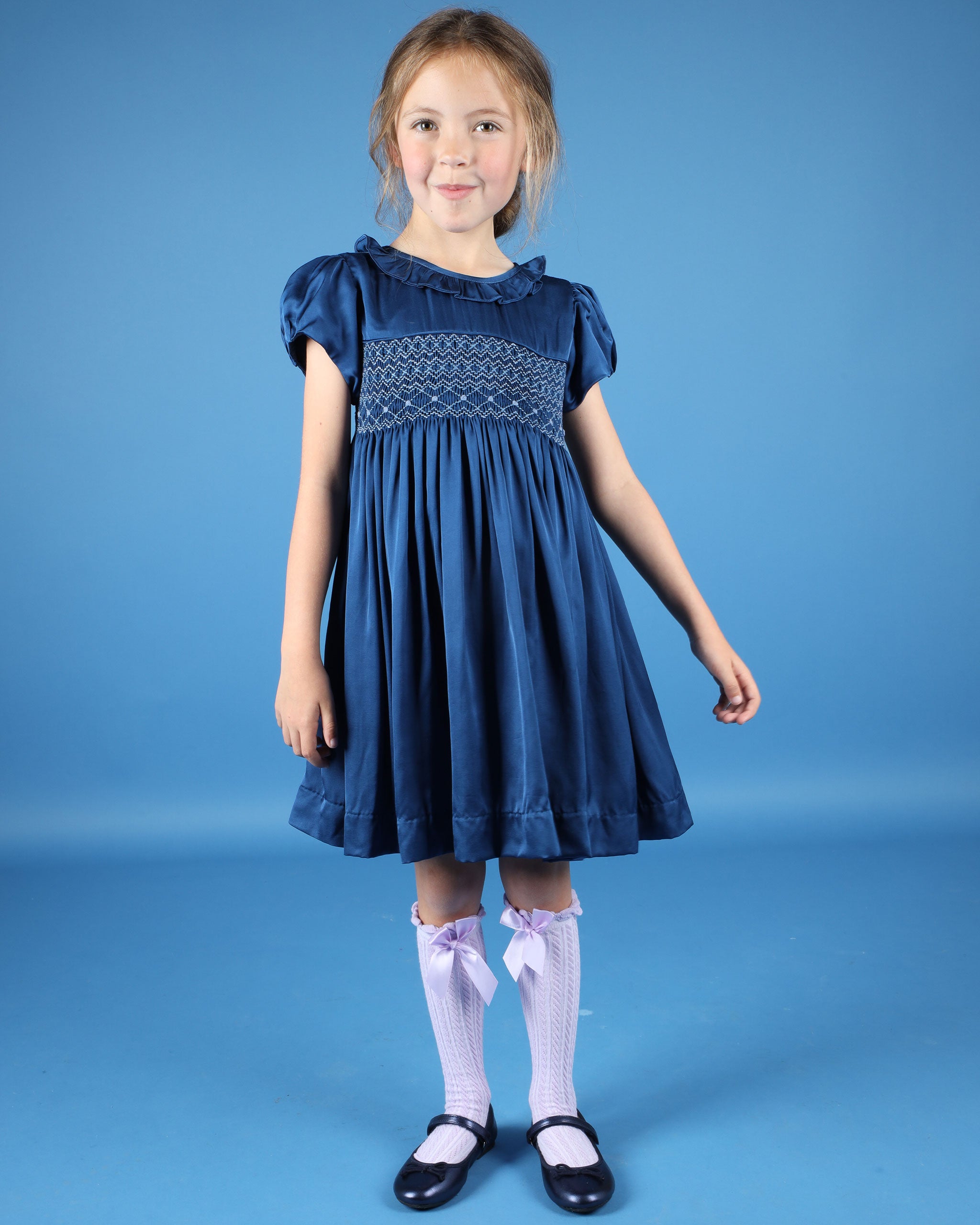 girl in blue party dress