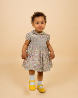 toddler in Liberty print dress, floral, hand-smocked