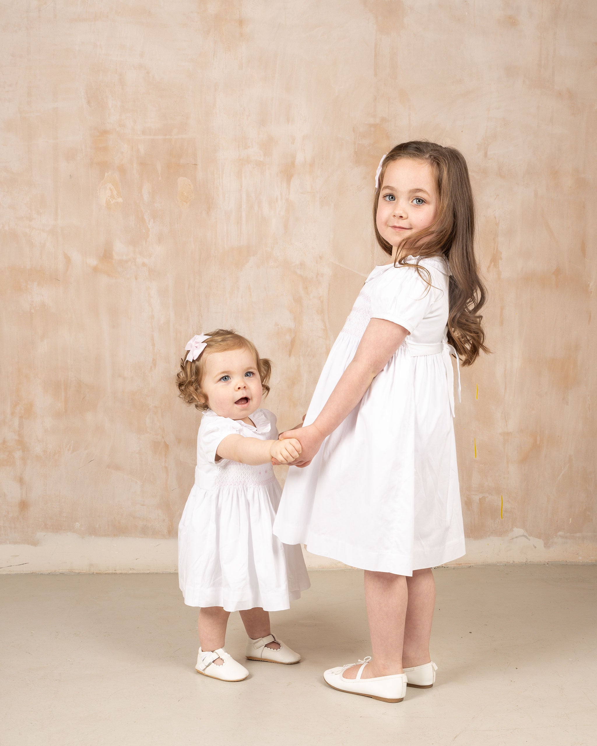 girls in occasional dresses, white