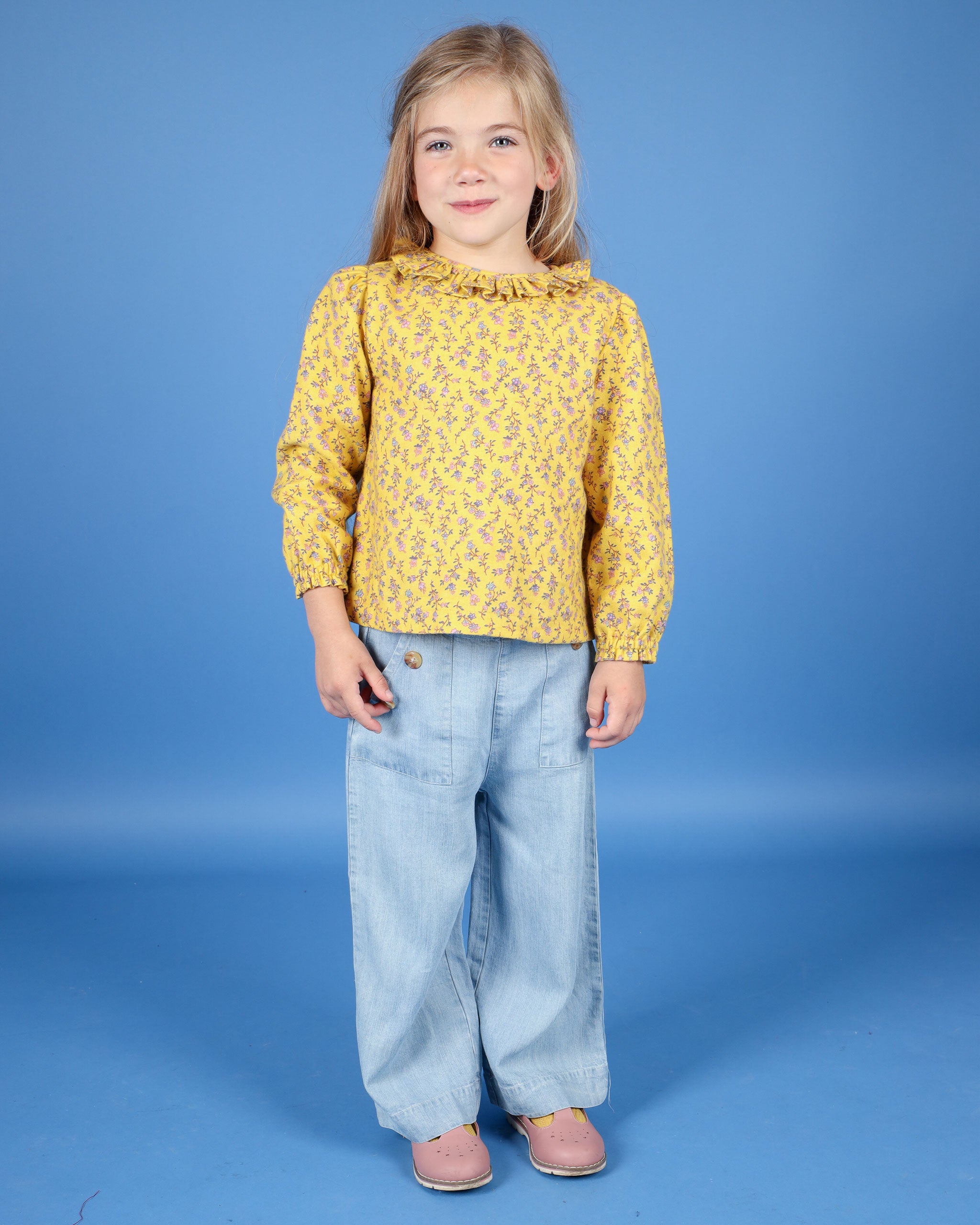 girl in yellow cotton blouse