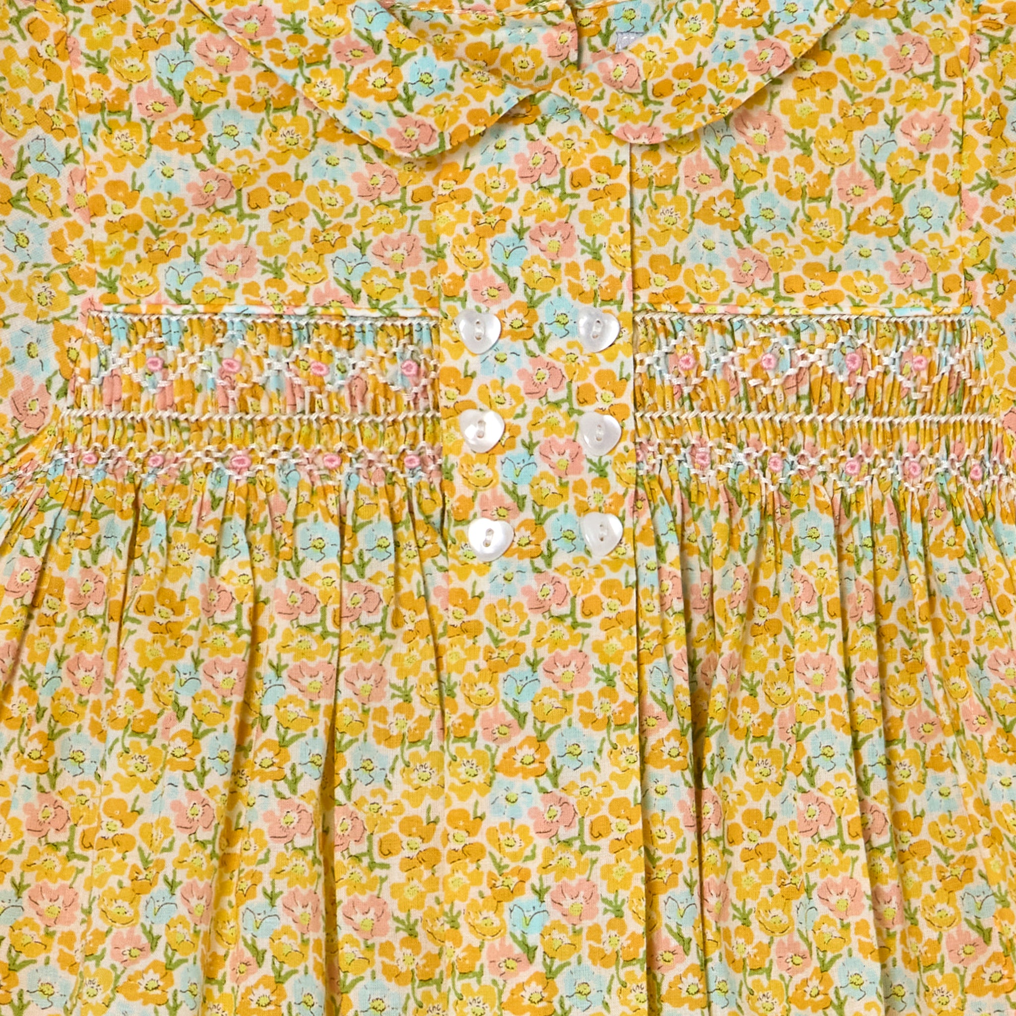 yellow floral dress with smocking detail