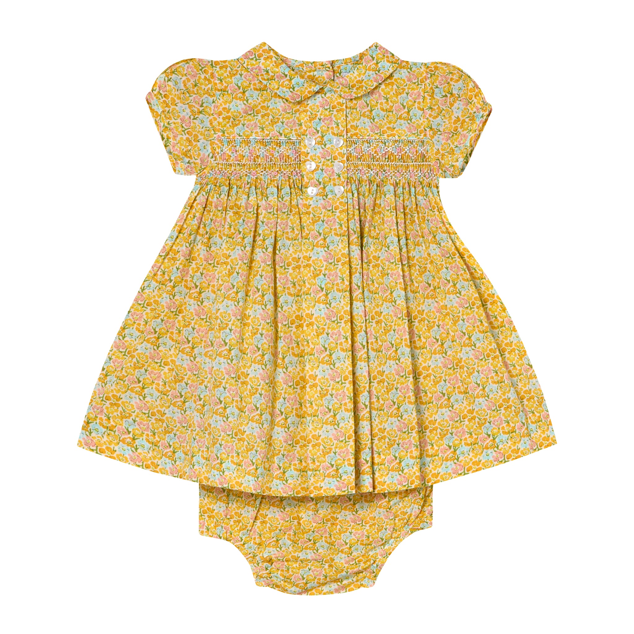 yellow floral baby dress with hand-smocking at the front