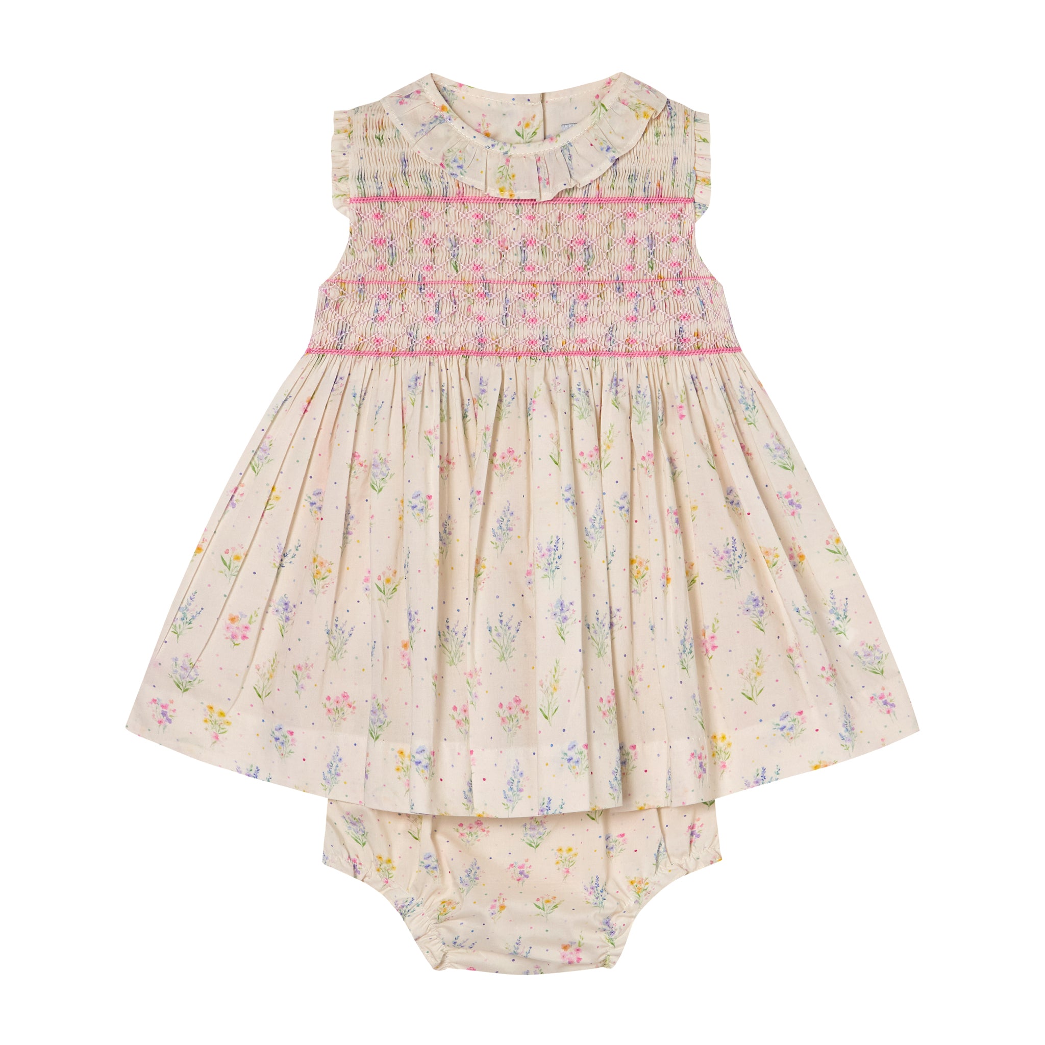 Floral dress and bloomers set on a white background