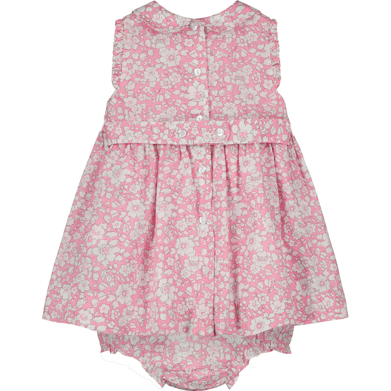 white on pink floral baby dress made from Liberty print fabric and matching bloomers, back