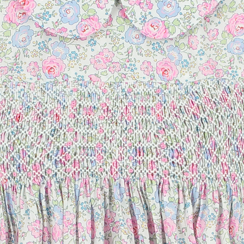 pastel tone floral girls dress made from Liberty fabric, smocking detail
