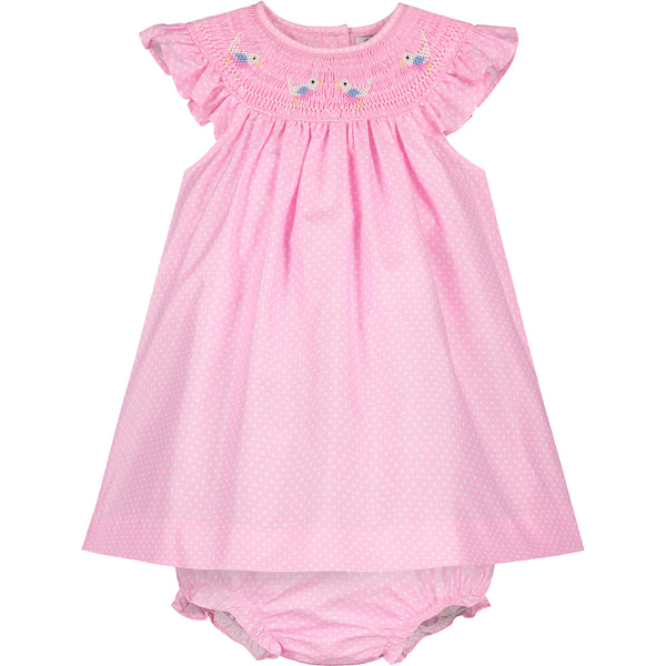 pink smocked baby dress, front