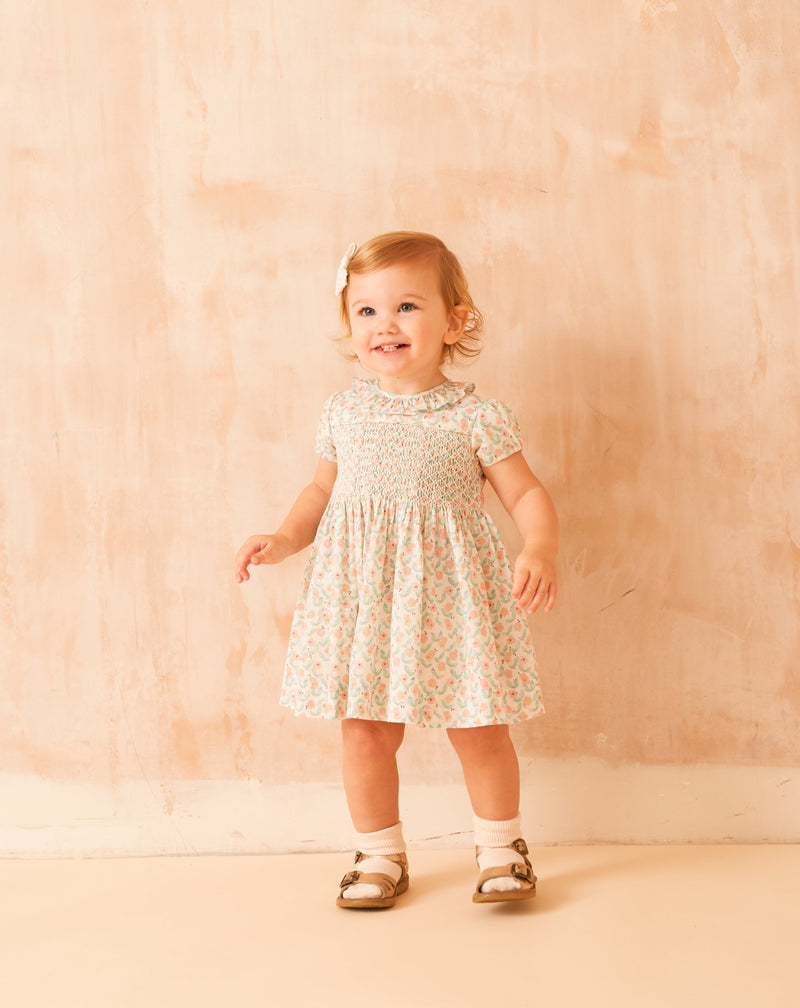 toddler in floral baby dress, hand-smocked 