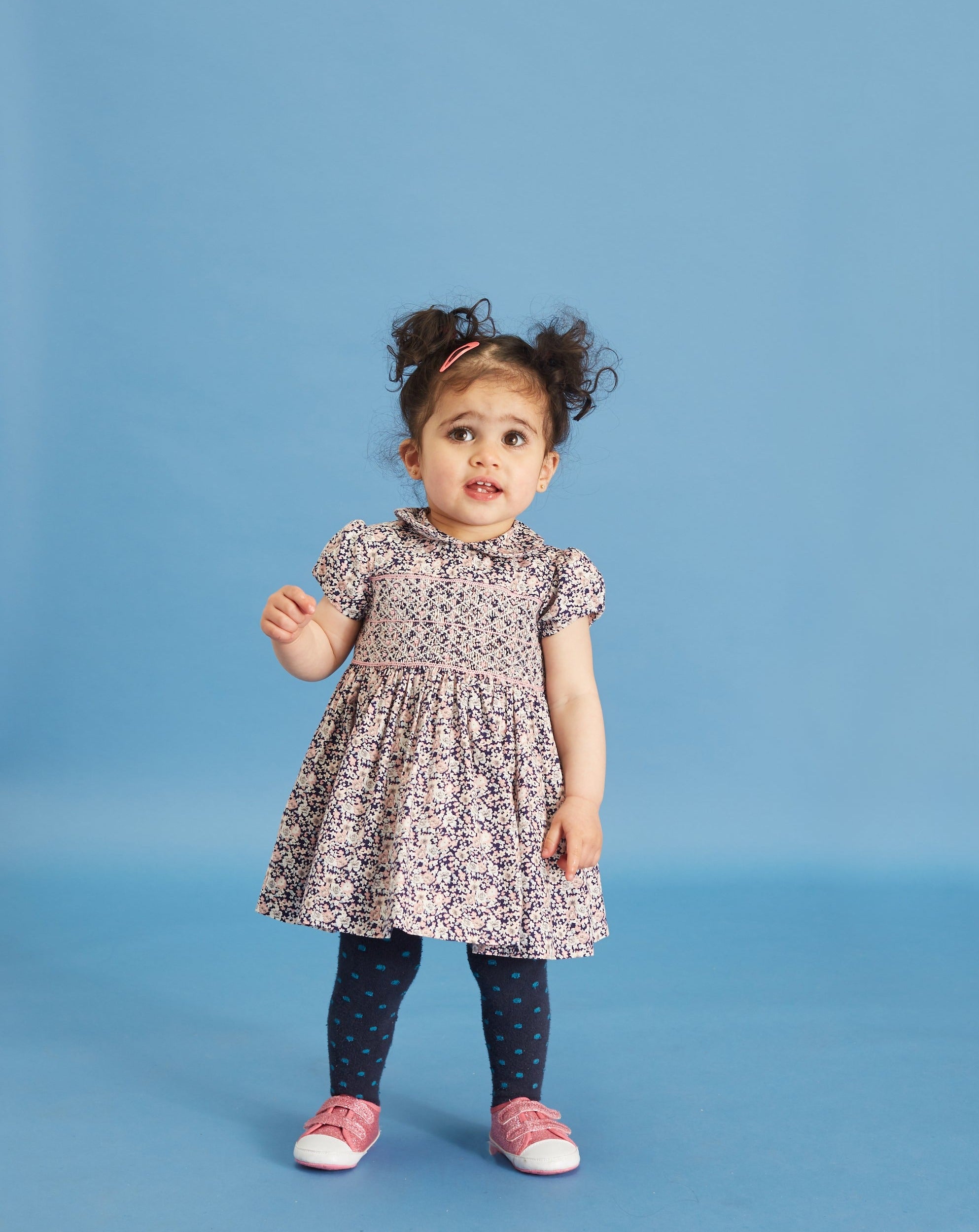 baby girl in hand-smocked dress