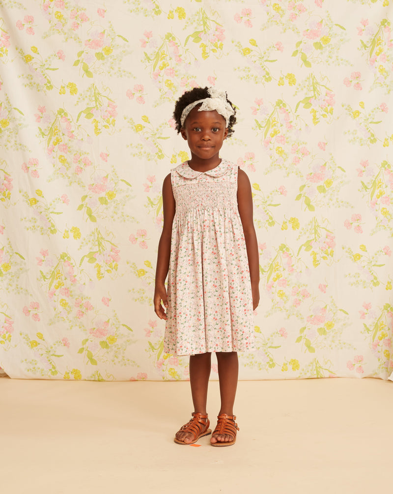 girl in smocked summer dress