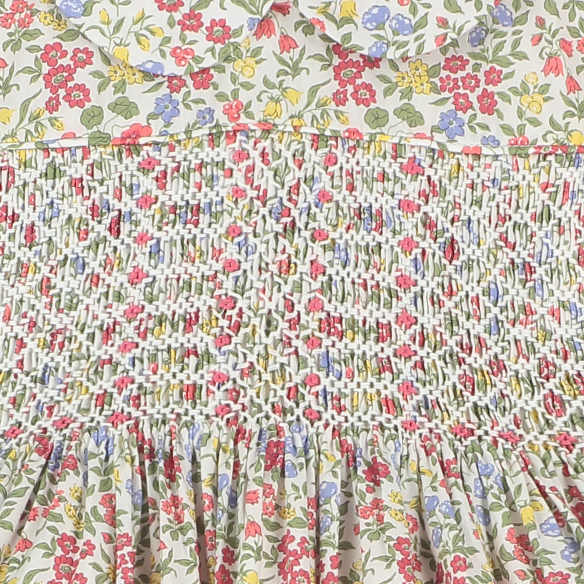 floral smock baby dress made from Liberty fabric, smocking detail