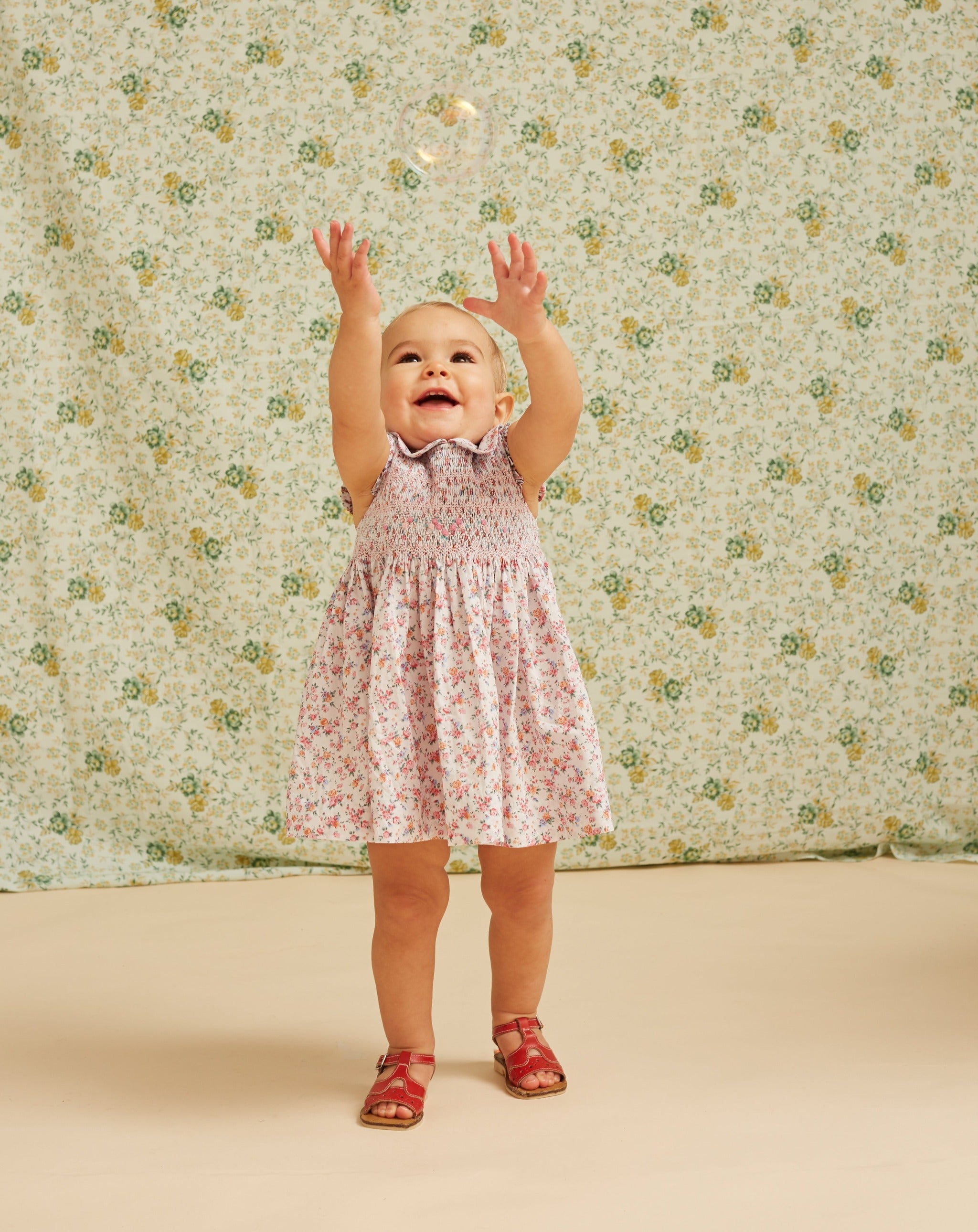 baby in sleeveless summer dress