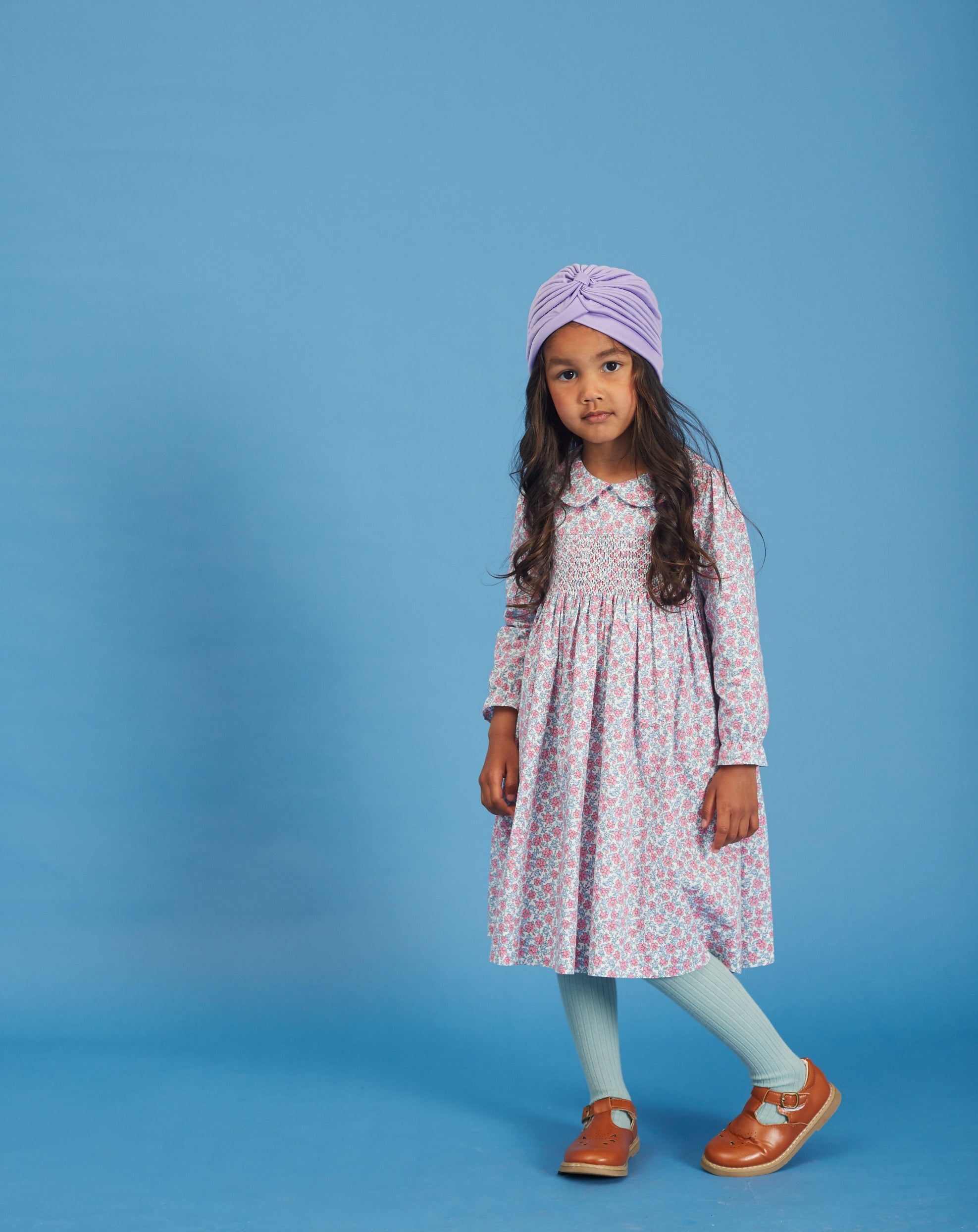 girls in hand-smocked dress