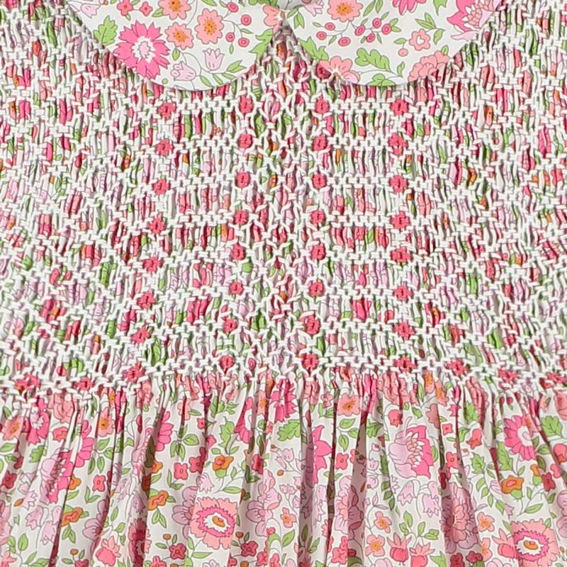 long sleeve, hand-smocked dress made from floral Liberty fabric, detail